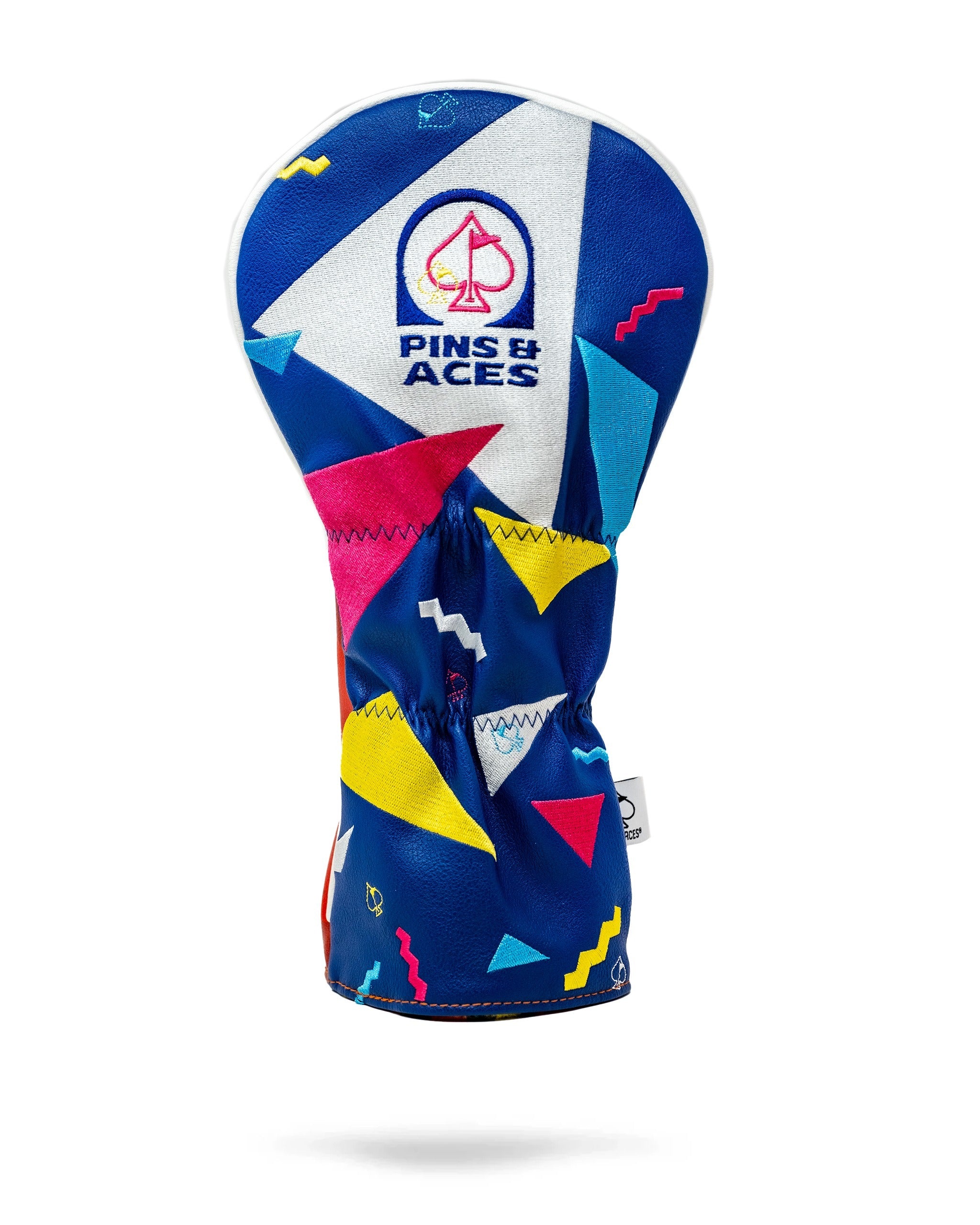 Bold driver cover featuring vibrant geometric patterns in blue, pink, and yellow, designed for stylish golfers.