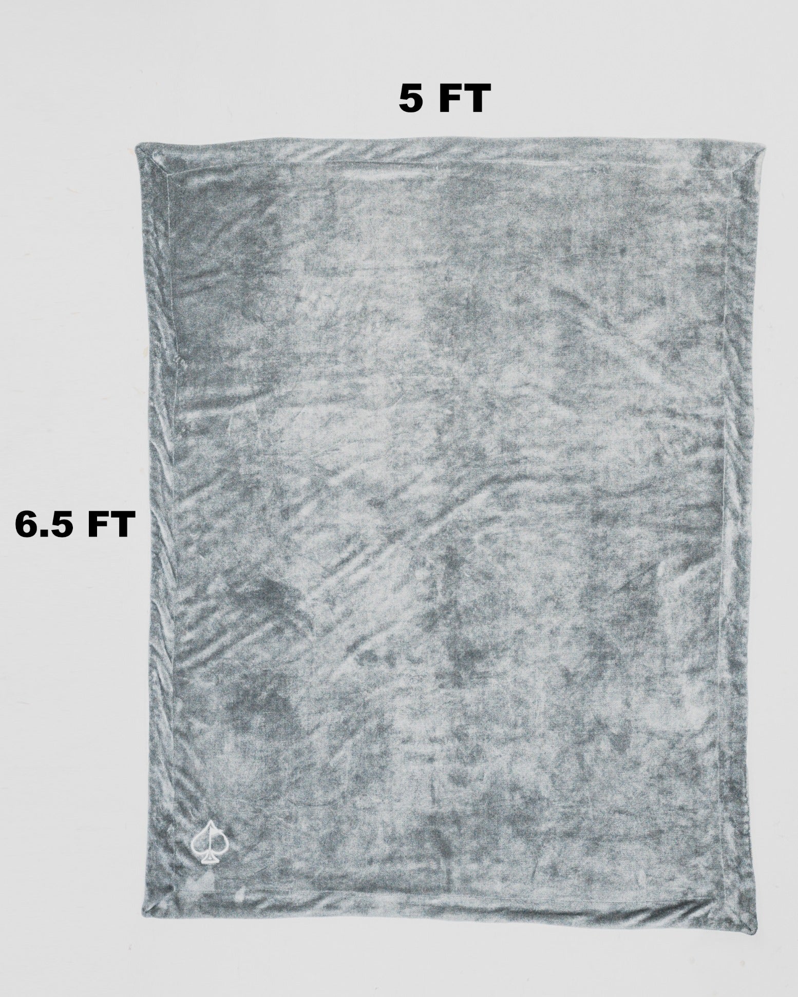 Light gray Bogey Blanket measuring 5 by 6.5 feet, perfect for cozying up on the golf course or at home.