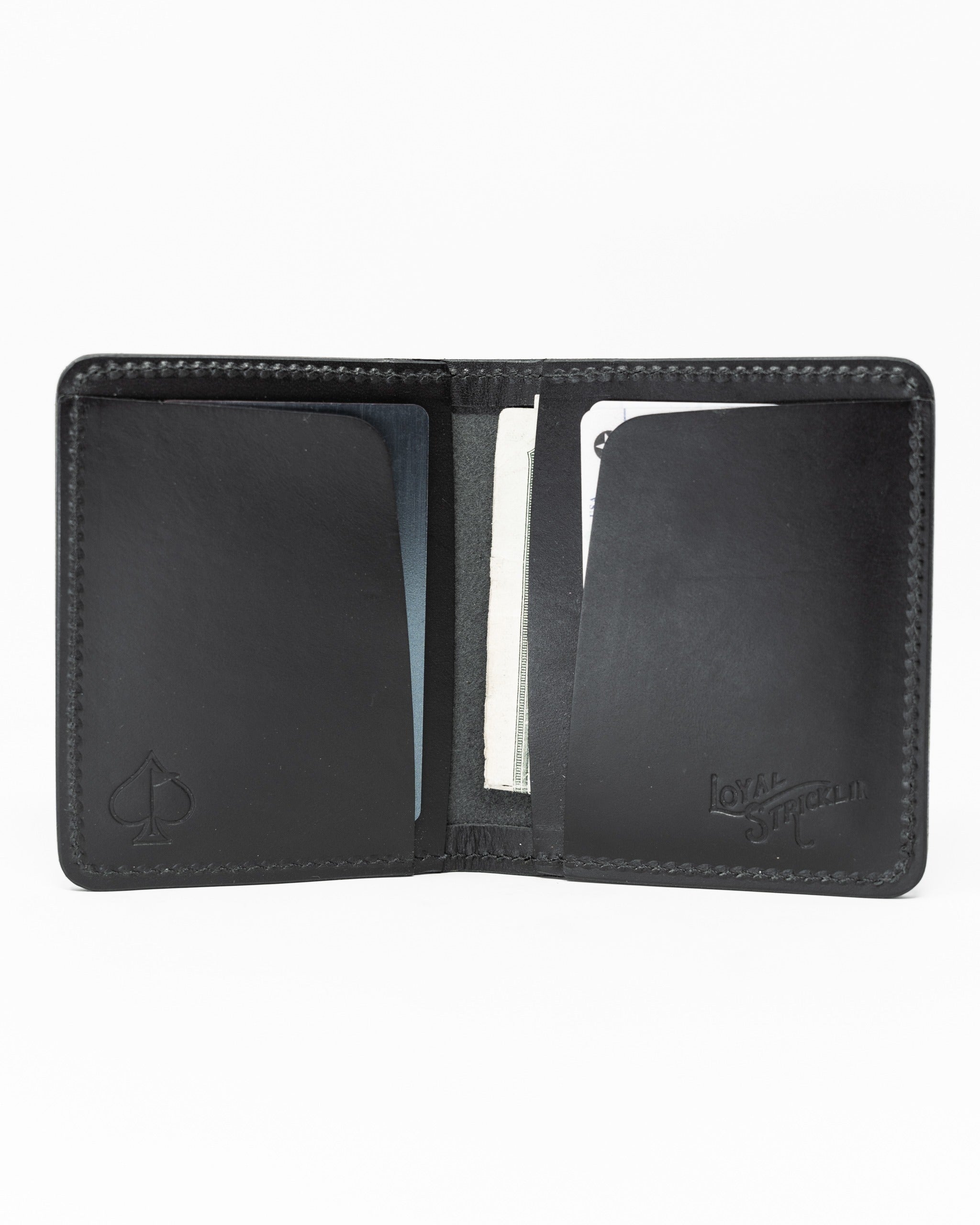 Sleek Italian black wallet featuring smooth leather, card slots, and a minimalist design for stylish organization.