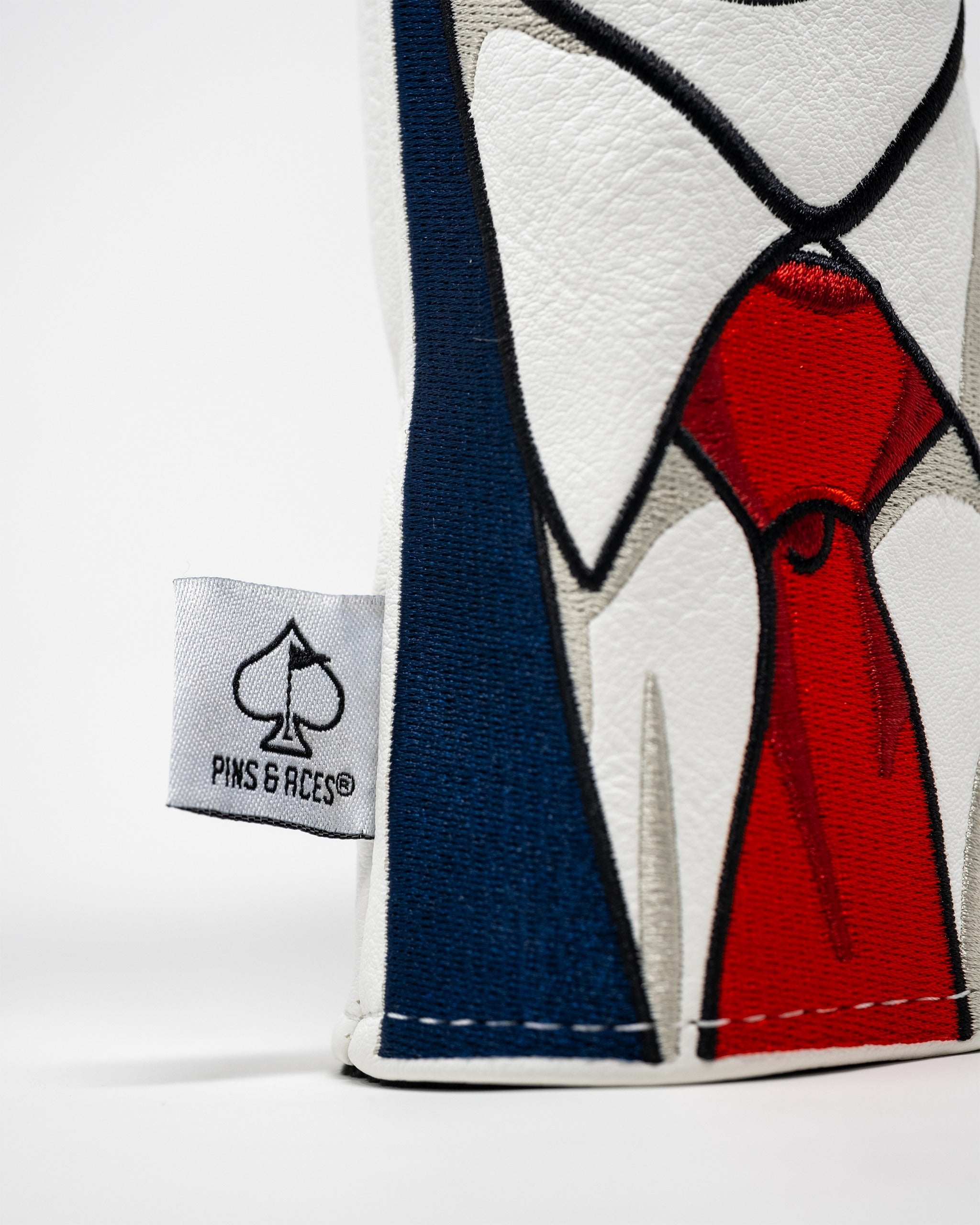 Bold hybrid golf cover featuring a suit design with a red tie, perfect for golfers looking to make a statement.