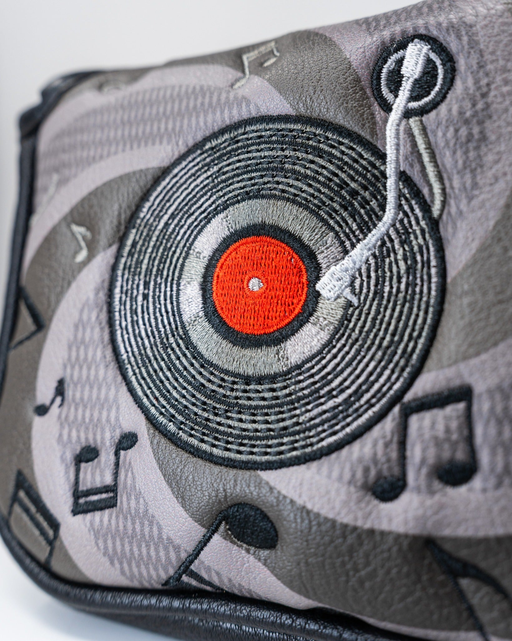 Music City mallet cover featuring a vinyl record design with musical notes, perfect for stylish golfers.