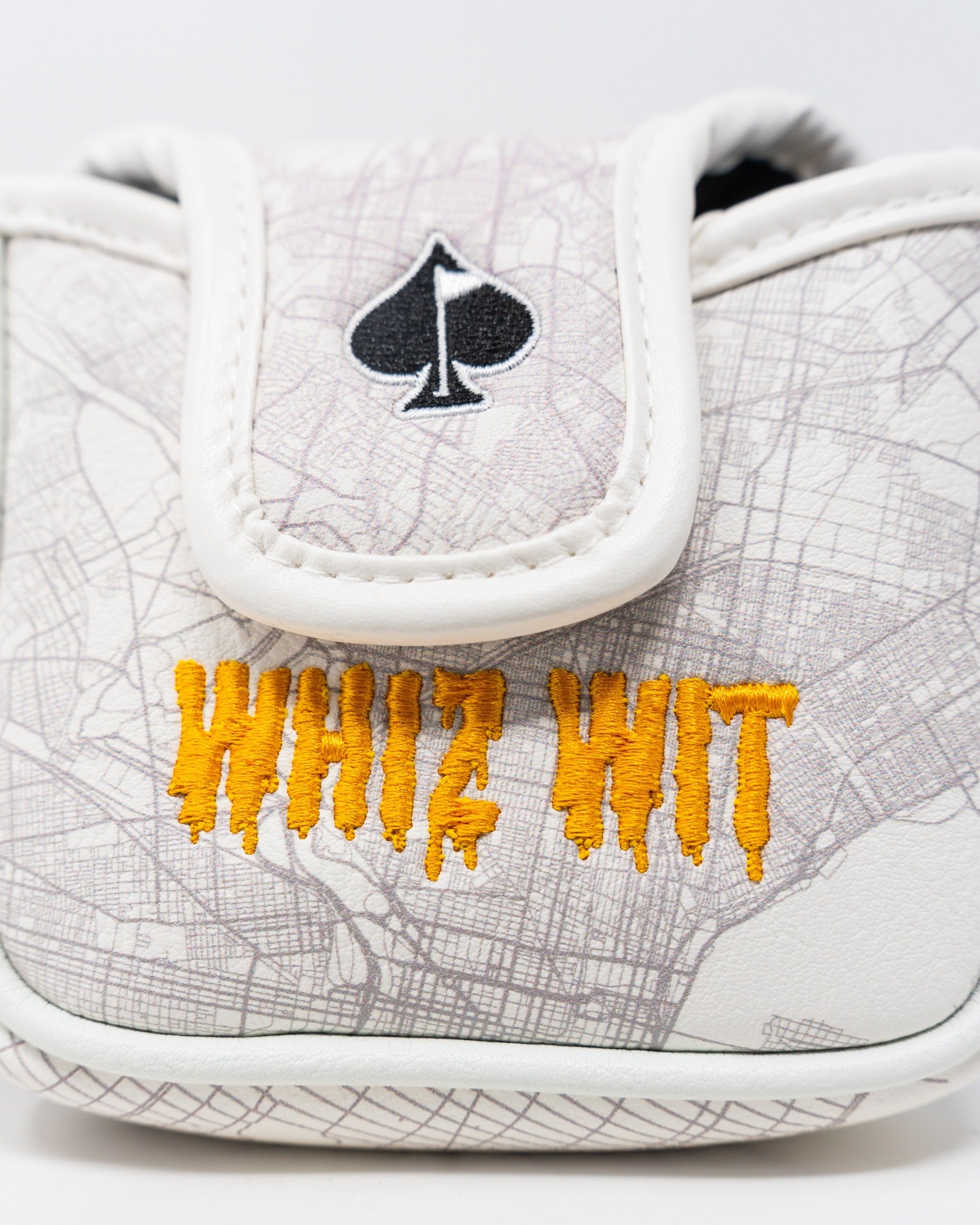 Whiz Wit mallet cover featuring a map design and bold orange embroidery, perfect for stylish golf accessories.