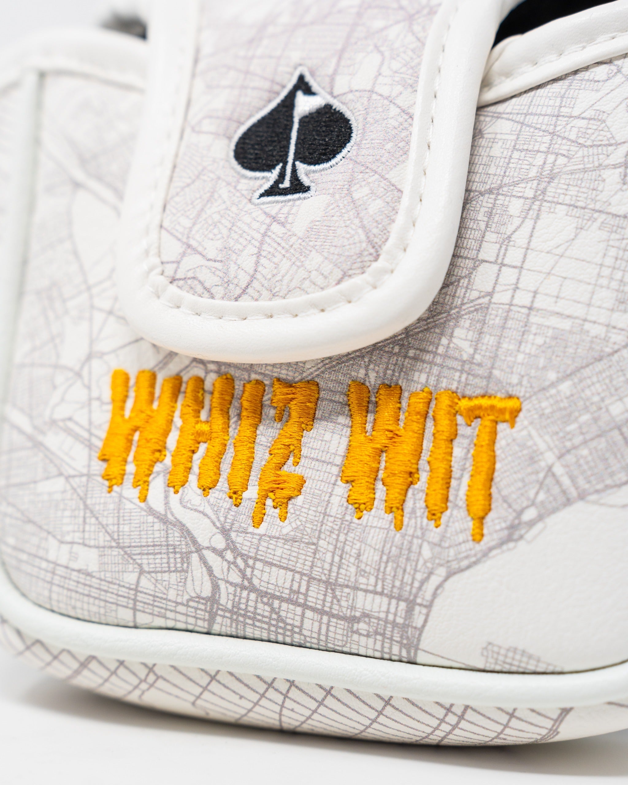 Bold Whiz Wit mallet cover featuring a city map design and vibrant orange embroidery, perfect for stylish golfers.