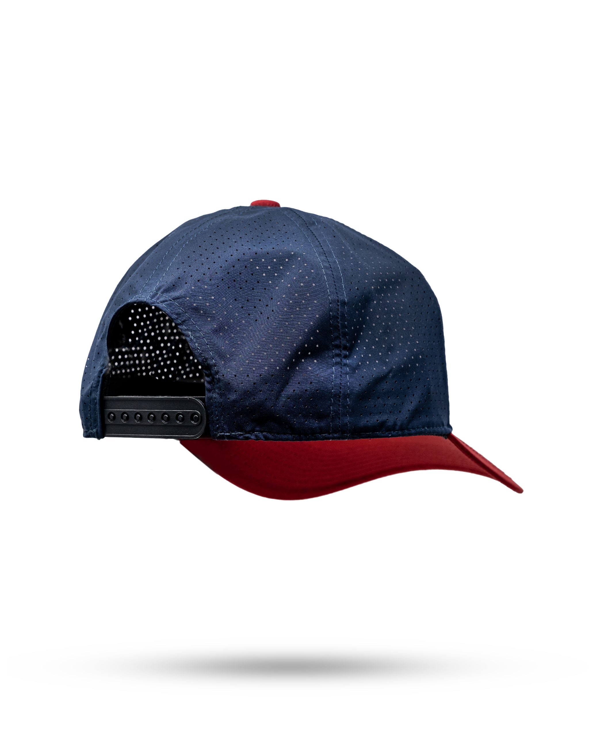 Stylish navy and red Tradesman Hat featuring breathable perforations and an adjustable strap for a comfortable fit.