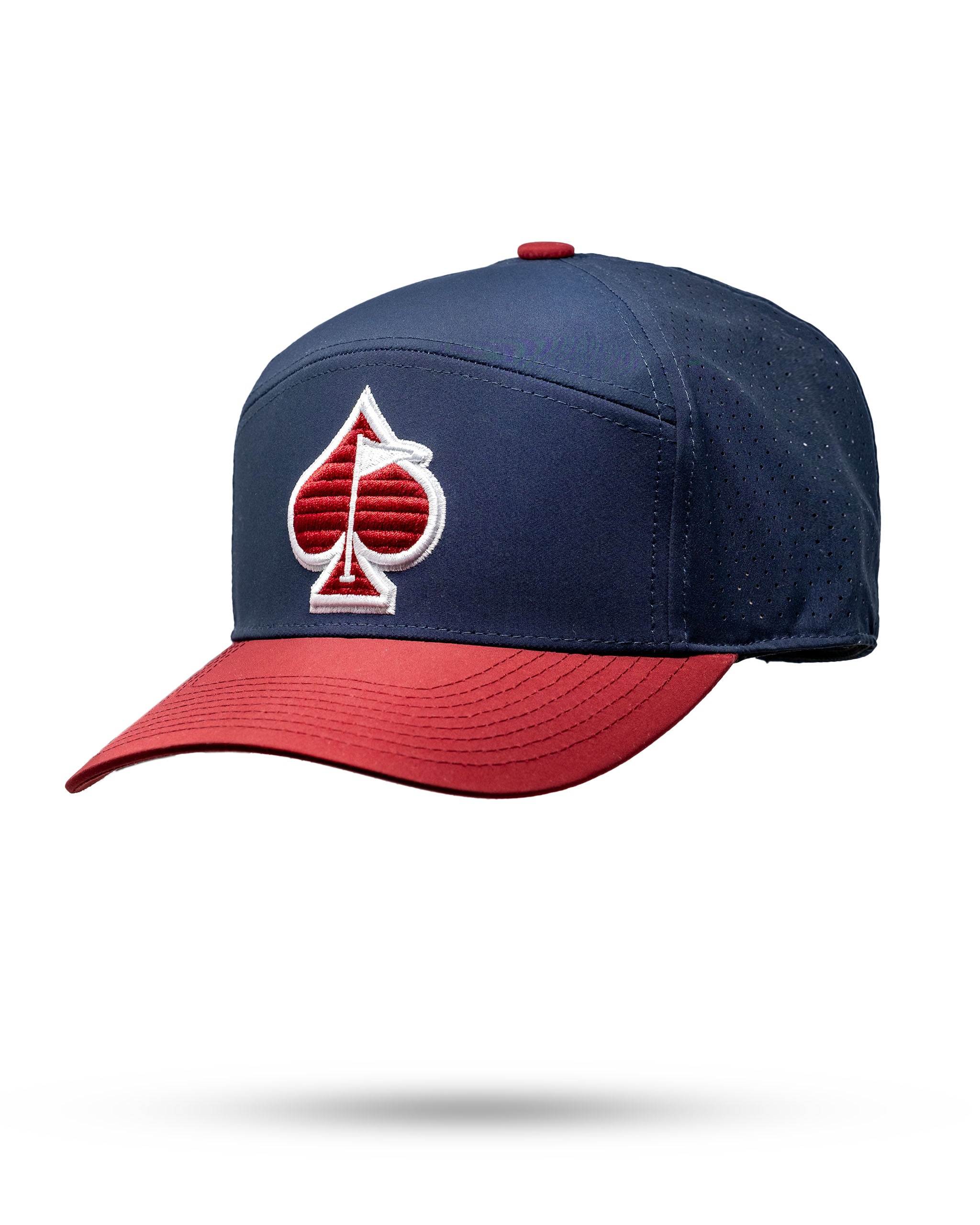 Patriot Tradesman Hat featuring a navy blue body and red brim, with a stylish spade logo on the front.