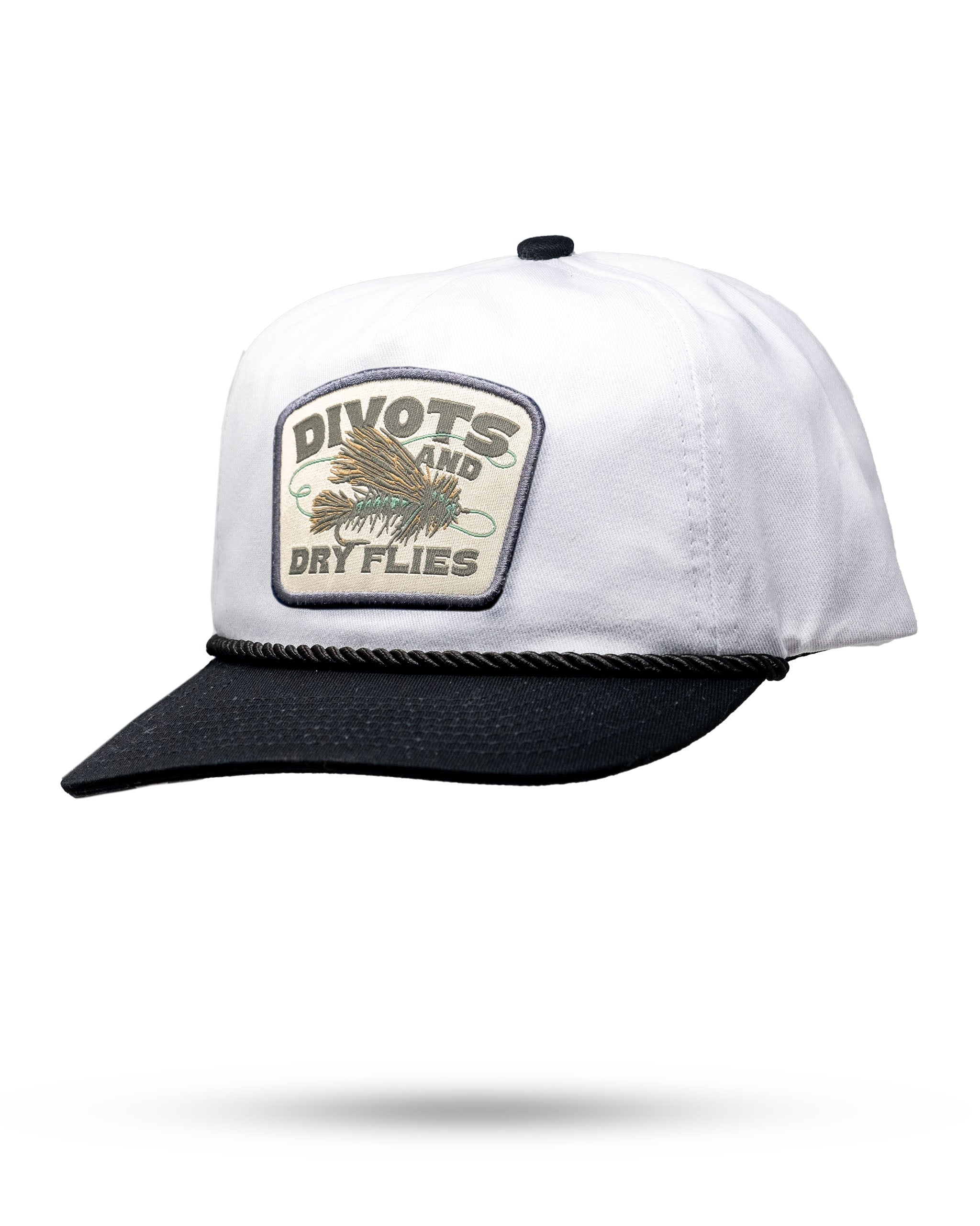 Heritage Rope Hat featuring a Divots and Dry Flies patch, with a white crown and black brim, perfect for stylish golfers.