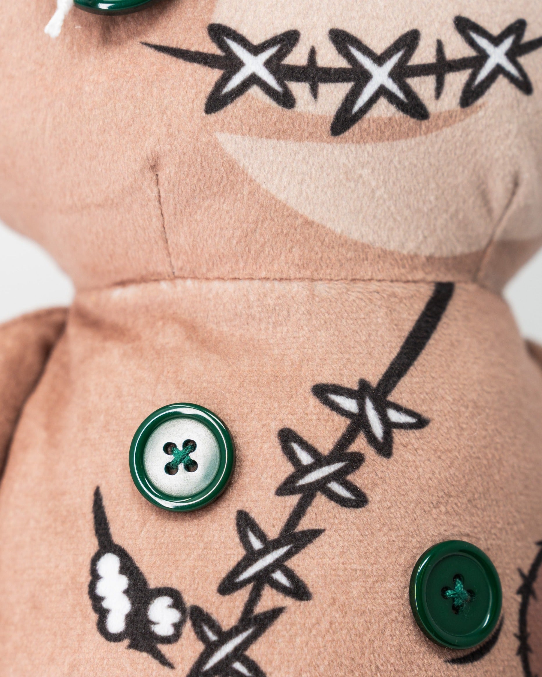 Voodoo Doll driver cover featuring a plush design with decorative buttons and stitched details for a unique golf accessory.