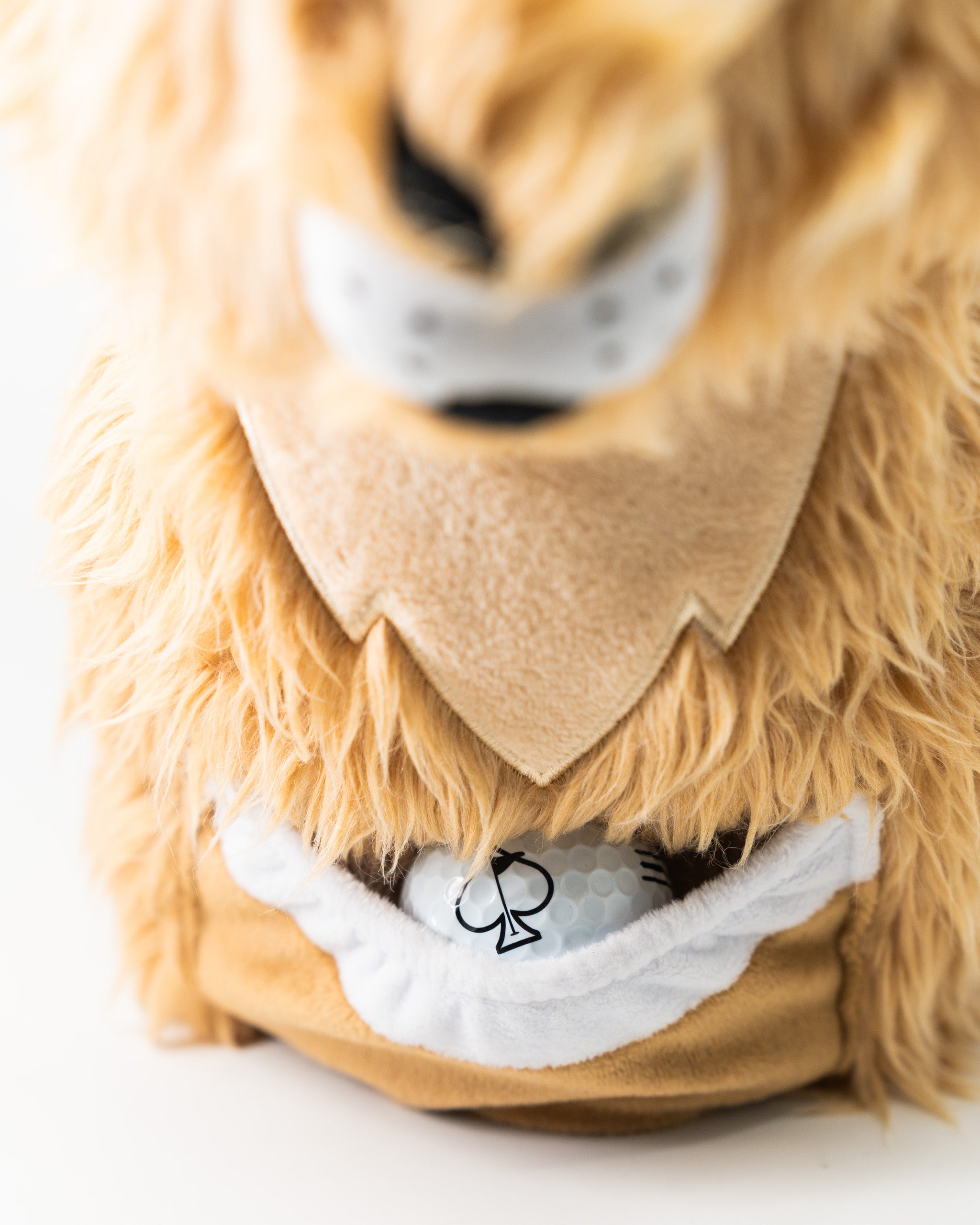 Kangaroo driver cover featuring a plush design with a pocket for storing a golf ball, perfect for stylish golfers.