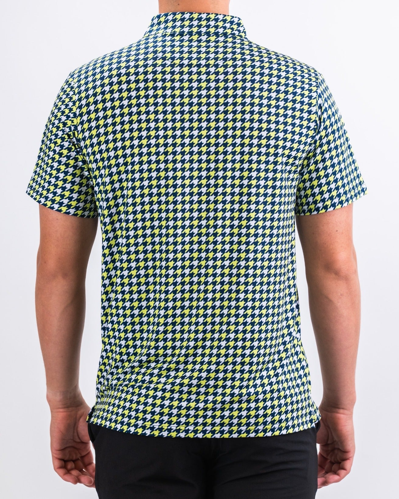 Men's short-sleeve golf shirt featuring a bold lime green and navy houndstooth pattern, designed for standout style on the course.