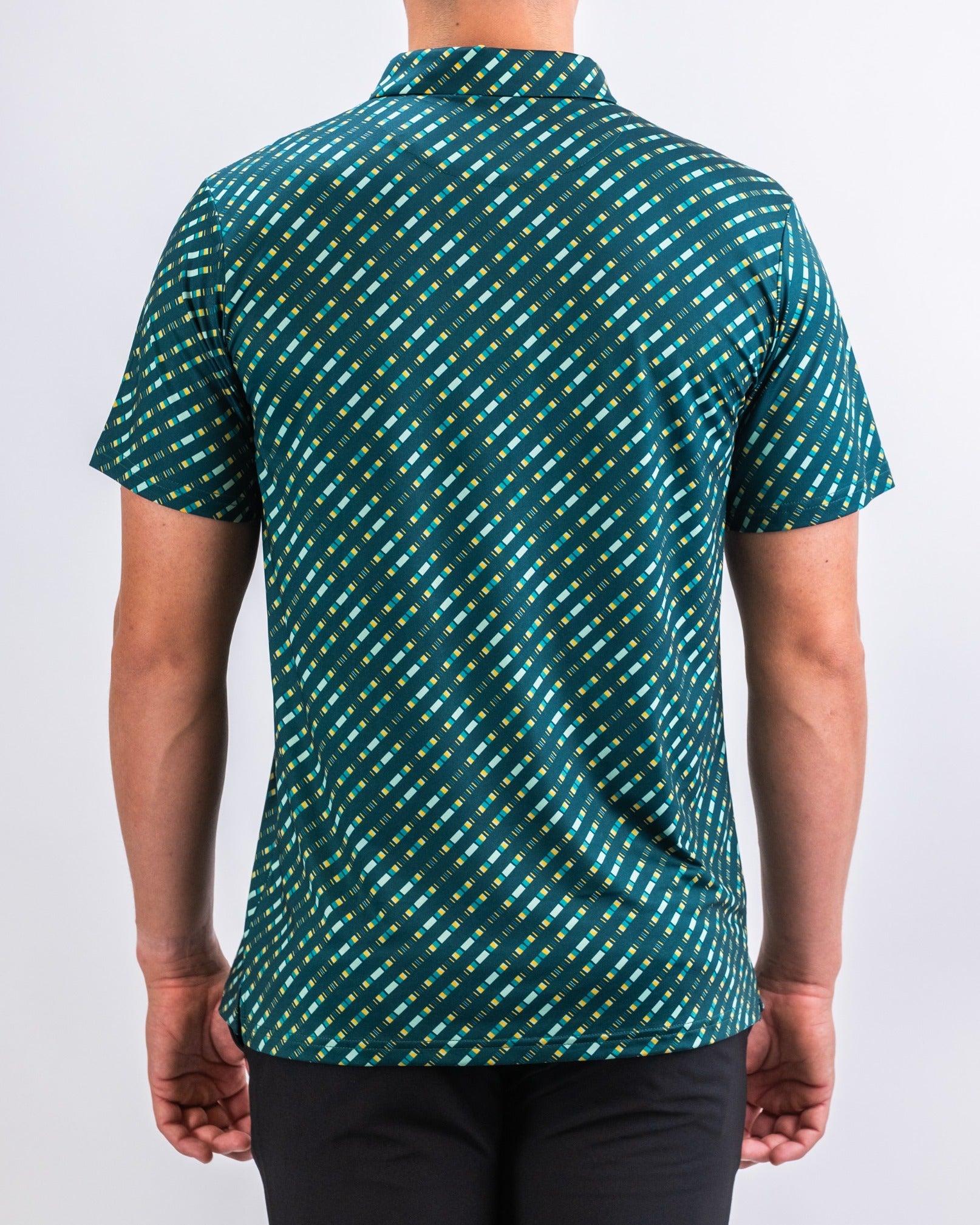 Men's short-sleeve golf shirt in chromo green with a bold geometric pattern, designed for stylish performance on the course.
