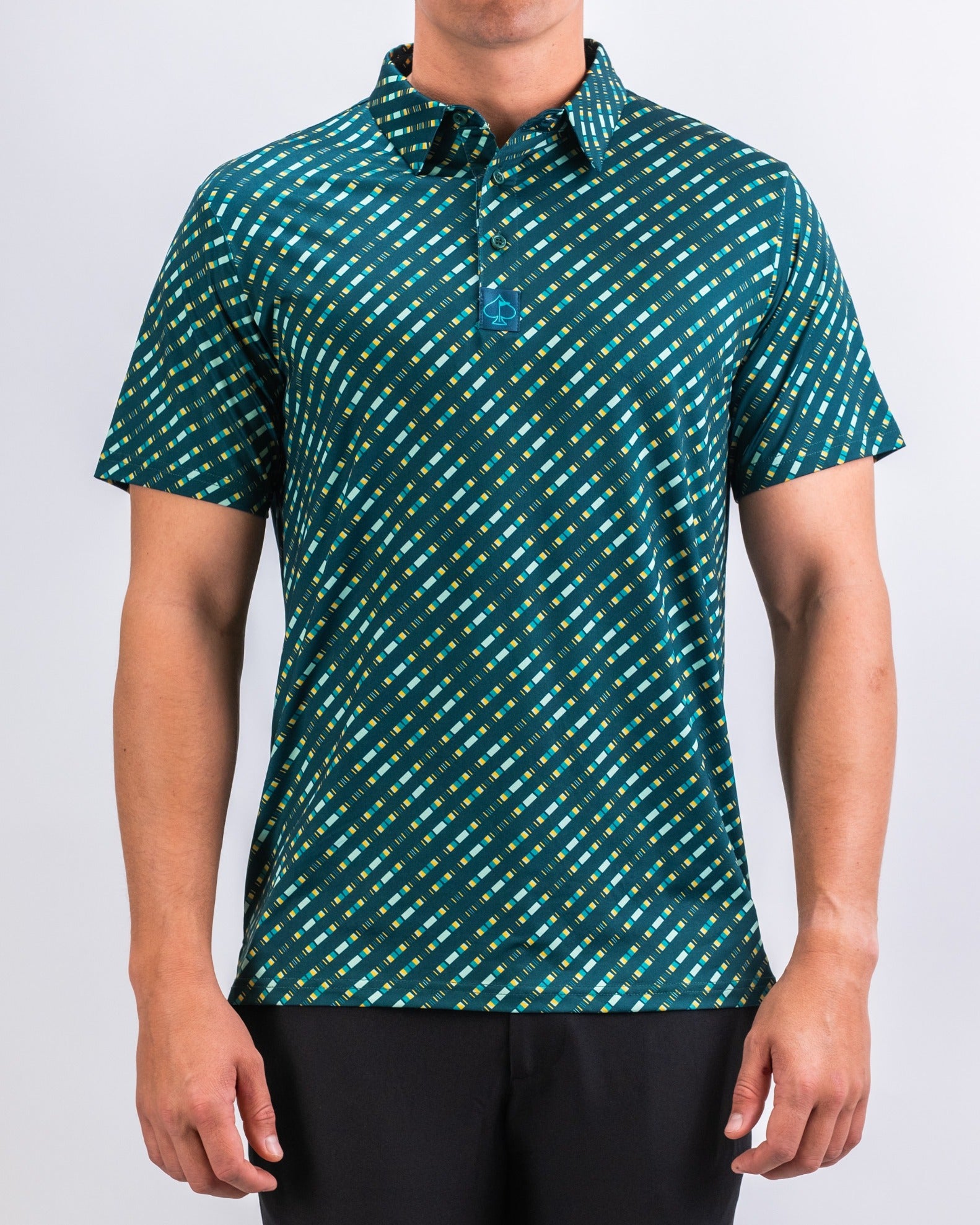 Men's short-sleeve golf polo in Chromo Green featuring a bold geometric pattern, perfect for stylish performance on the course.
