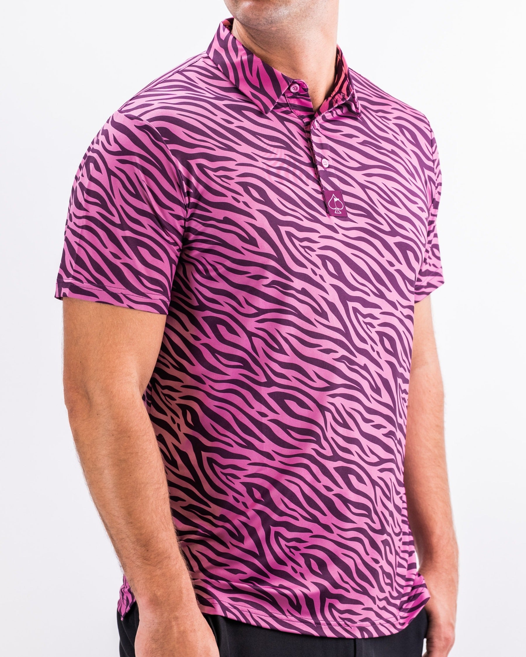 Bold violet polo shirt featuring a striking zebra print, perfect for golfers looking to make a statement on the course.