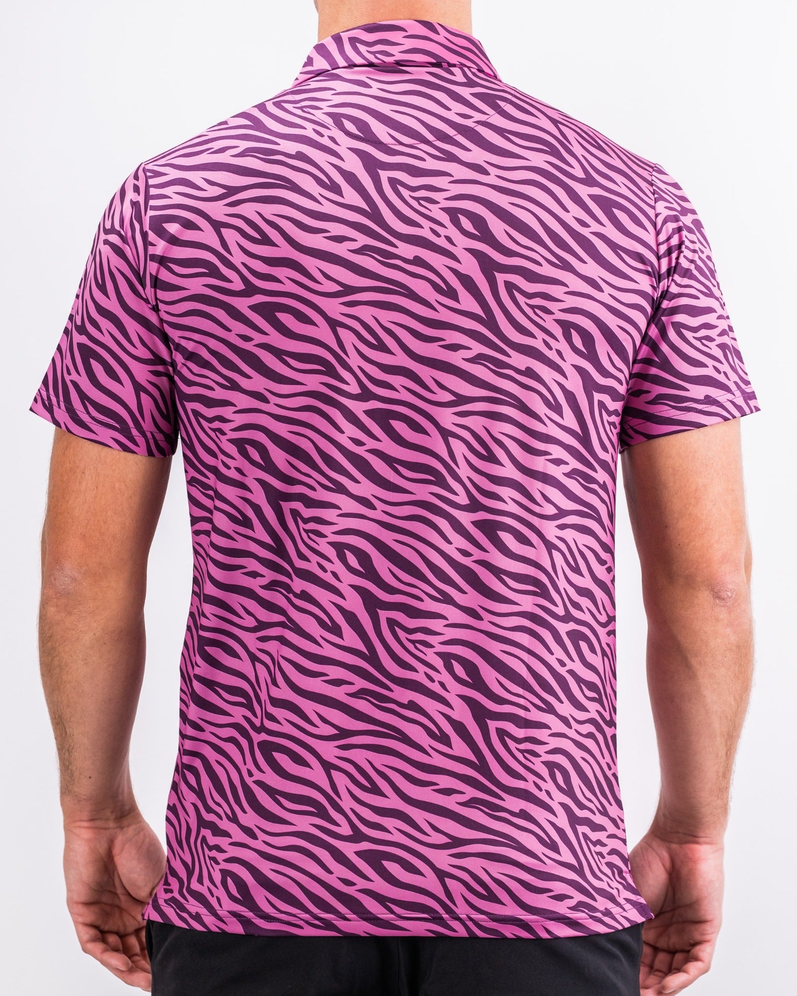 Bold violet and pink tiger stripe golf shirt designed for golfers who want to stand out on the course.