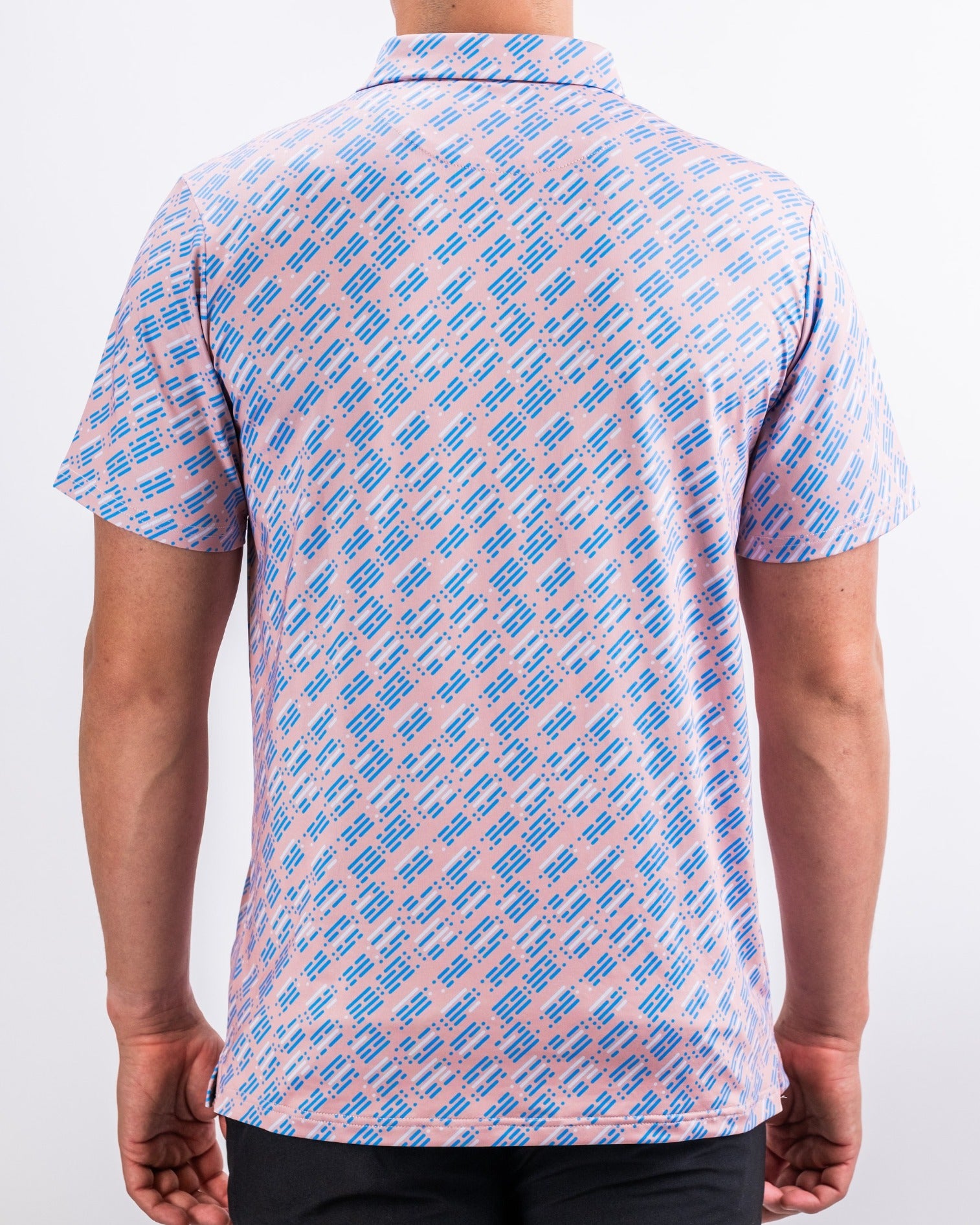 Men's Skyline Dash Pink golf shirt featuring a vibrant pink and blue geometric pattern, perfect for stylish performance on the course.