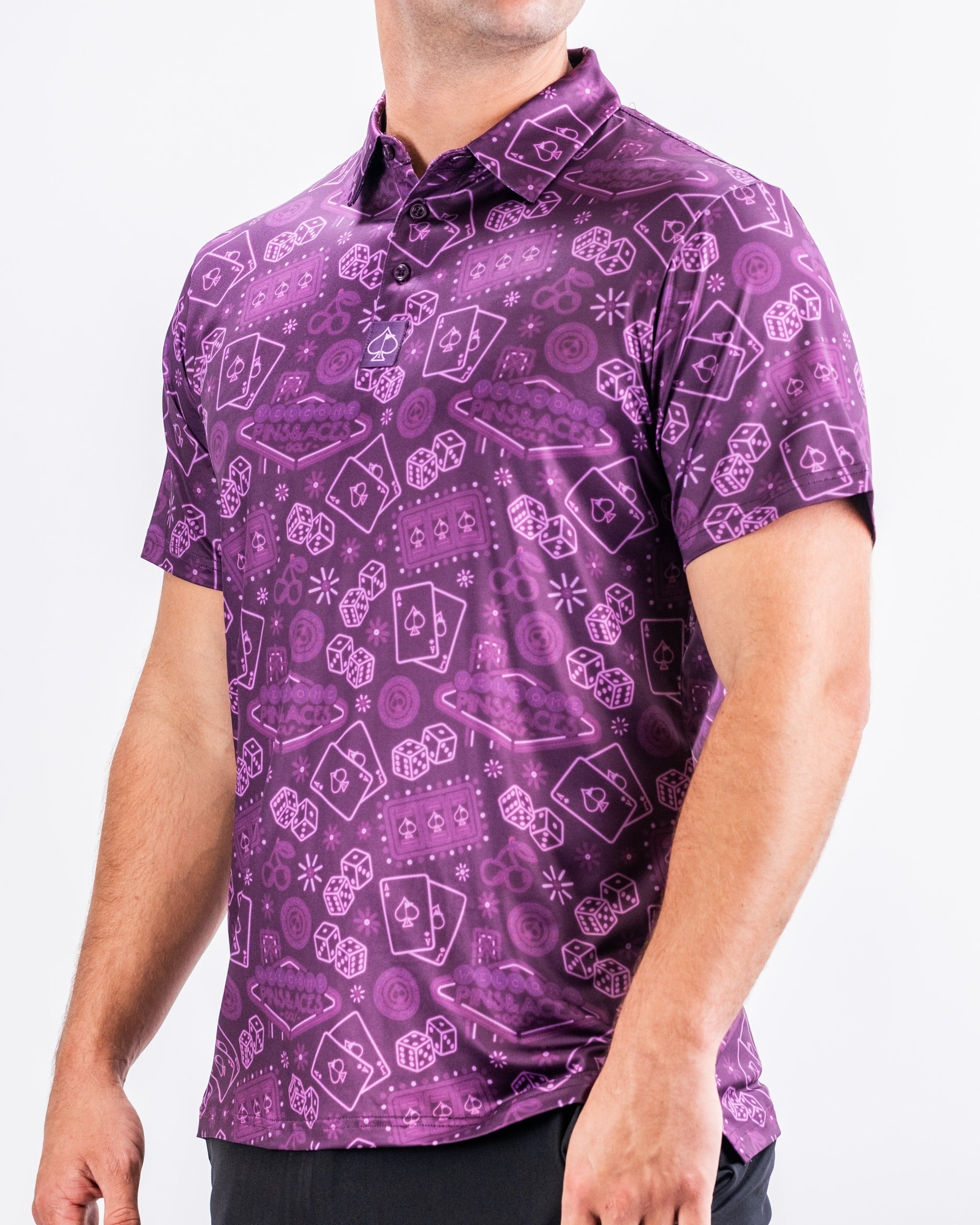 Bold purple golf polo featuring playful graphics, perfect for golfers who want to make a statement on the course.
