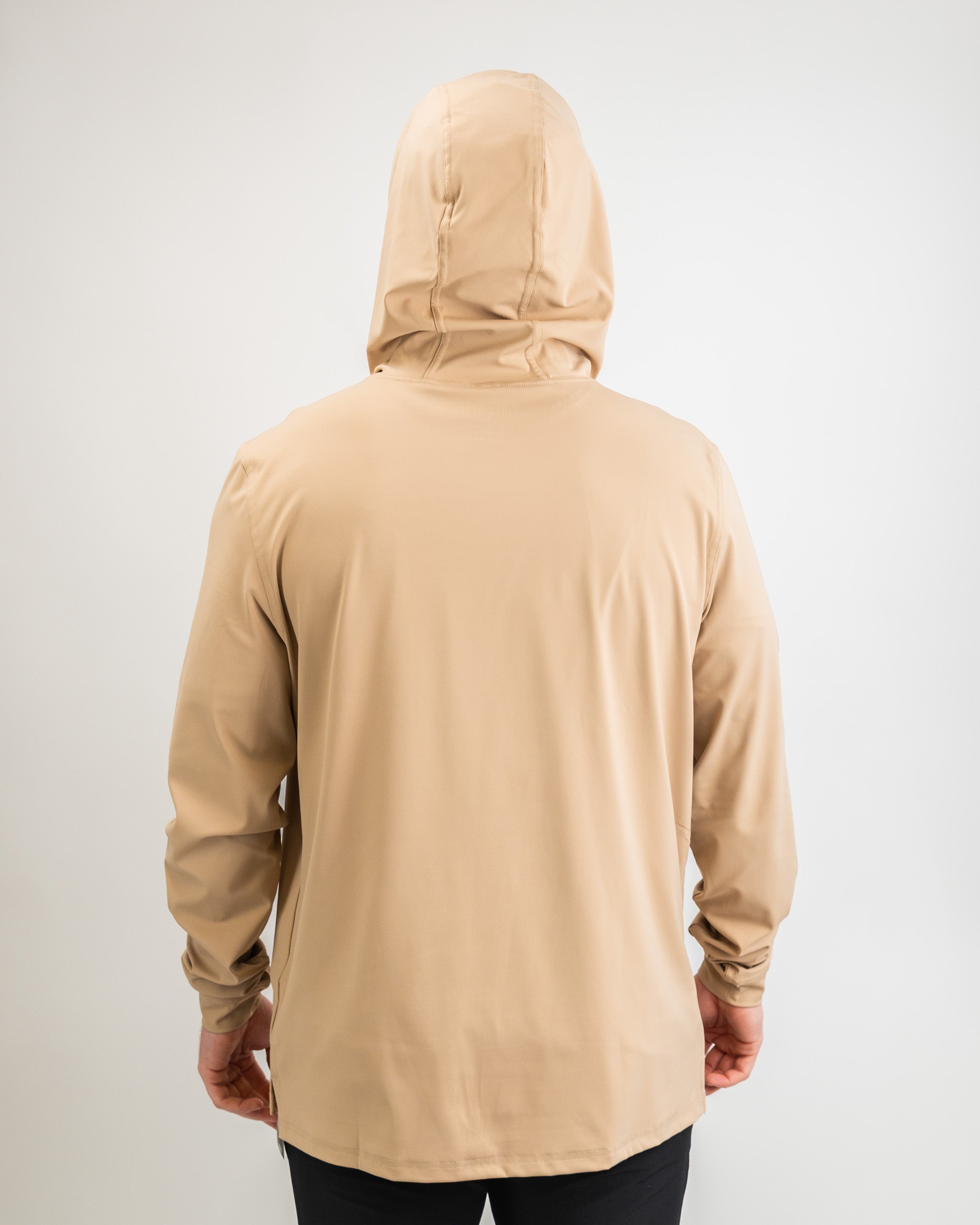 Men's performance golf hoodie in sand color, featuring a lightweight design and adjustable hood for comfort on the course.
