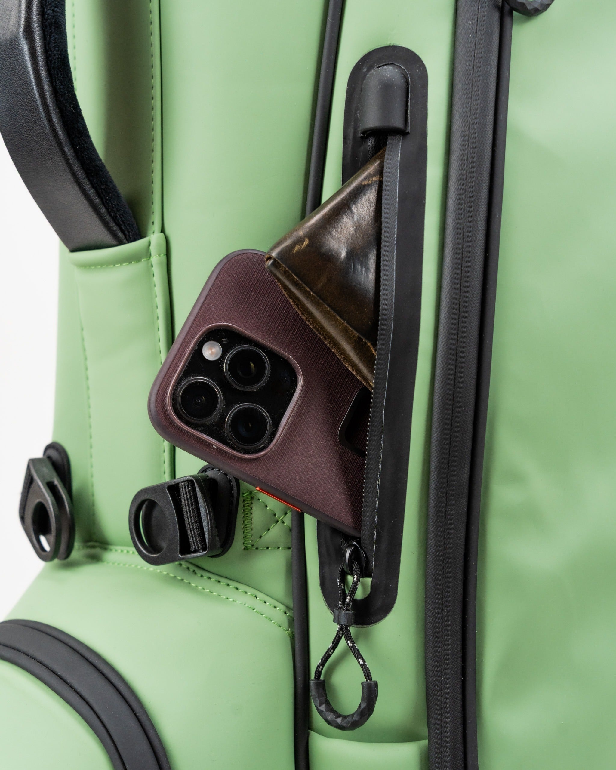 Sage Player Preferred Golf Bag featuring a side pocket with a smartphone and wallet for convenient storage on the course.