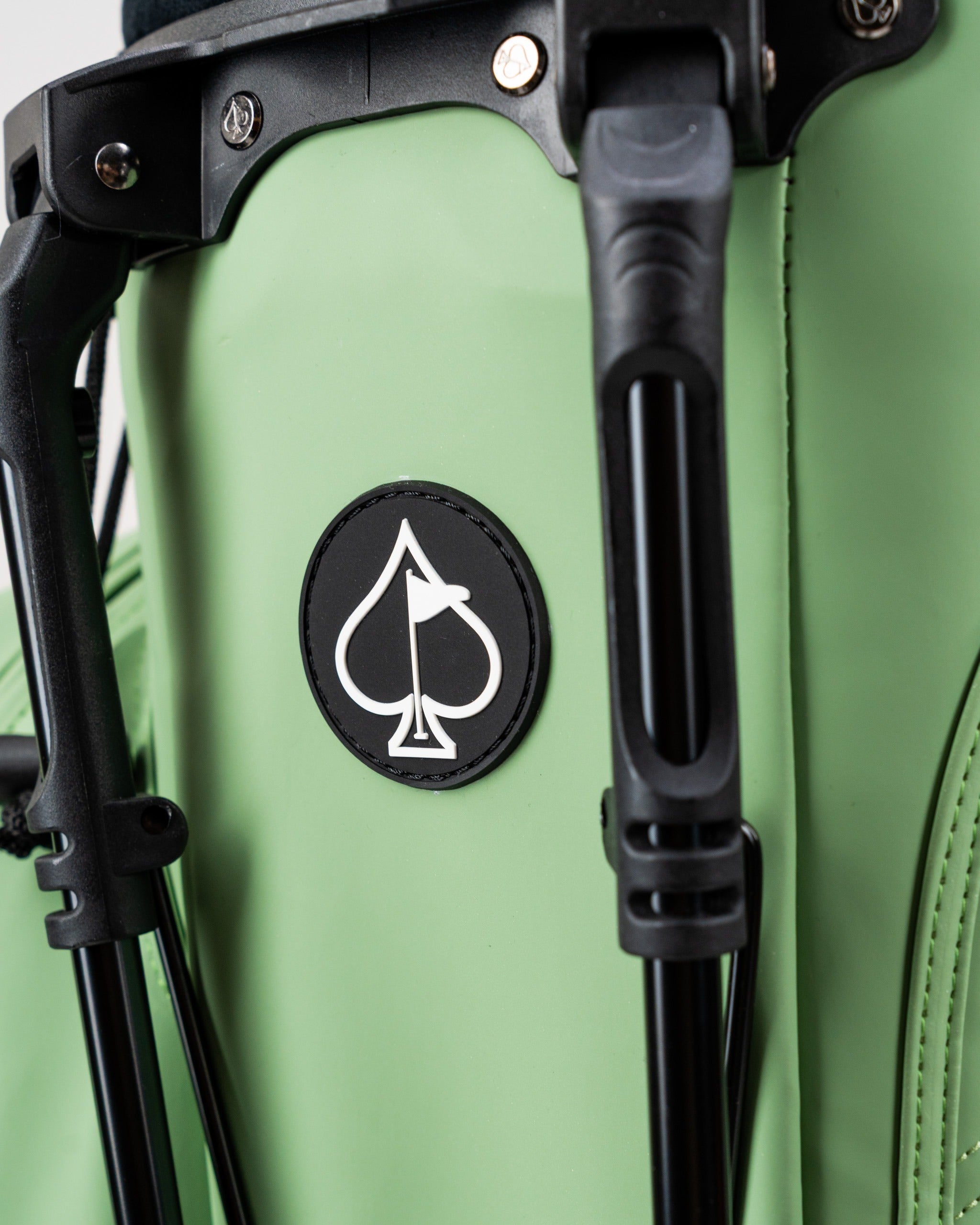 Sage Player Preferred Golf Bag featuring a black spade logo and sturdy support stands for enhanced stability on the course.
