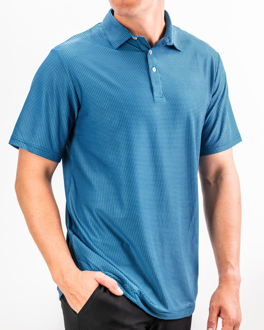 Men's Player Preferred Polo in Ocean Wave features a textured blue pattern, perfect for stylish comfort on the golf course.