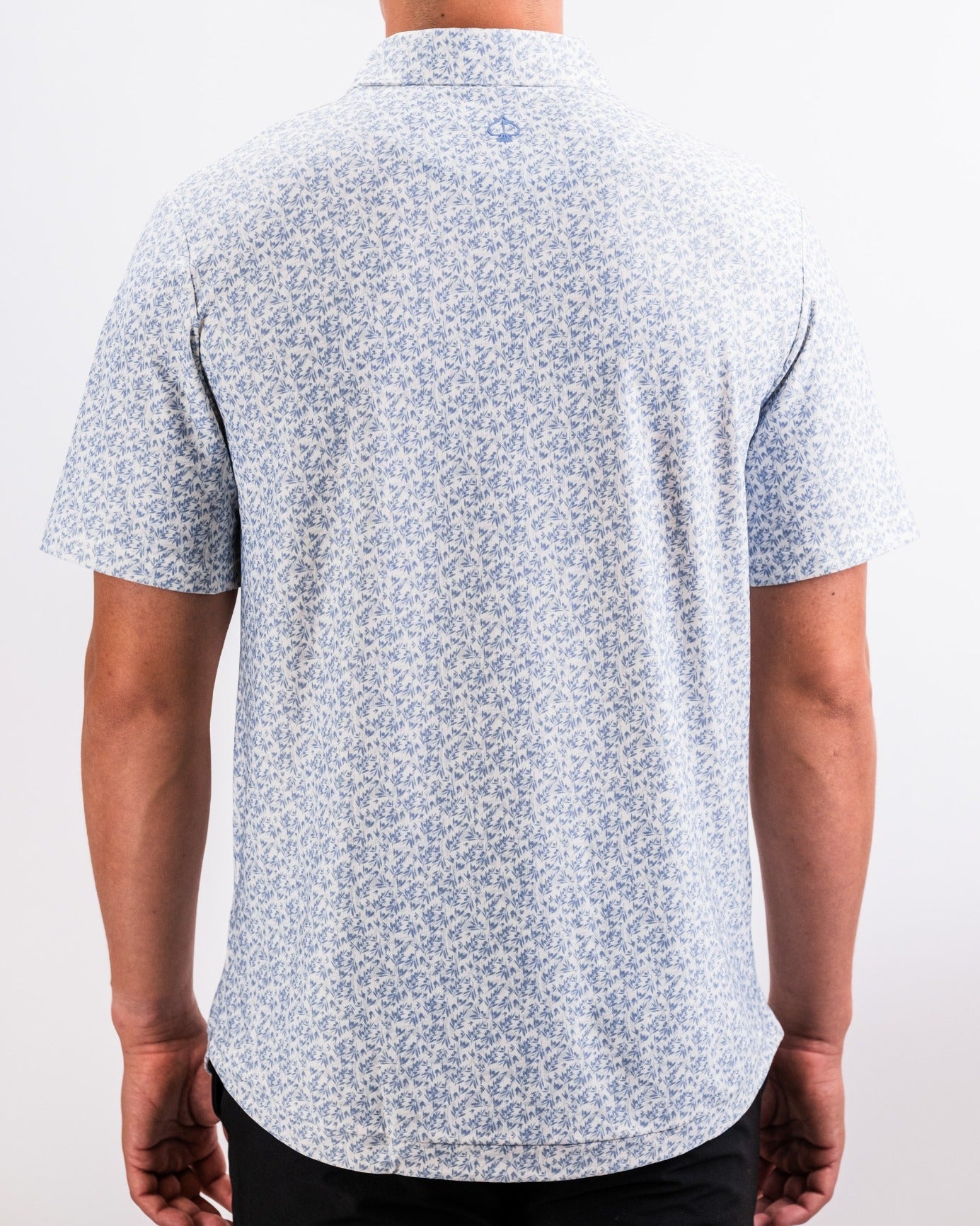 Men's Player Preferred Polo in Olive Groves features a stylish floral pattern, perfect for a standout look on the golf course.