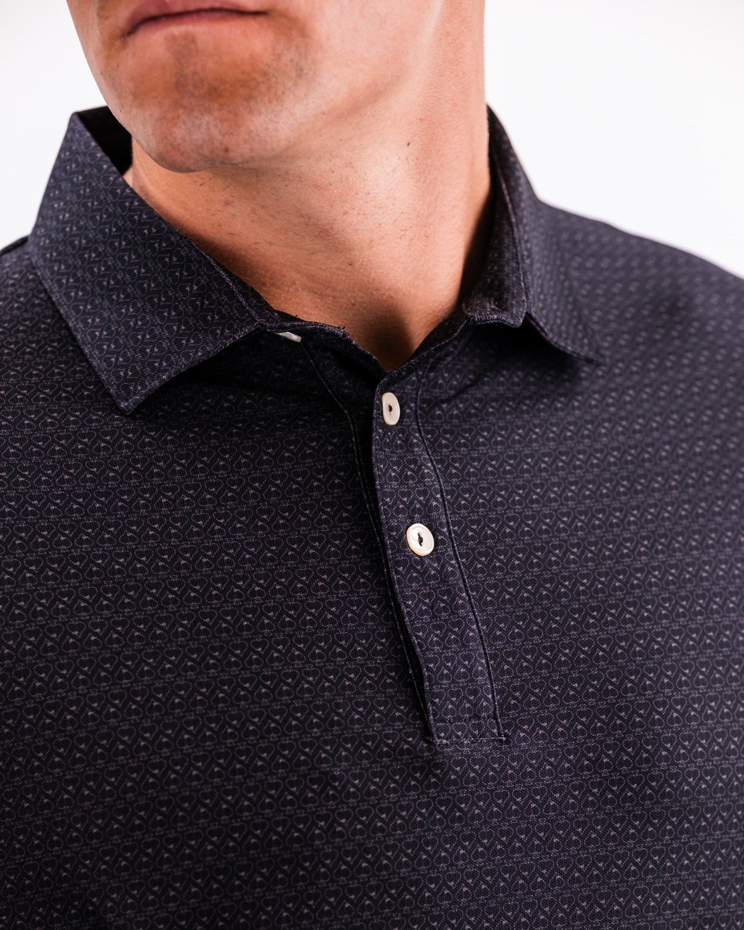 Men's Player Preferred Polo in Midnight Spade features a textured pattern and a classic collar for a stylish golf look.