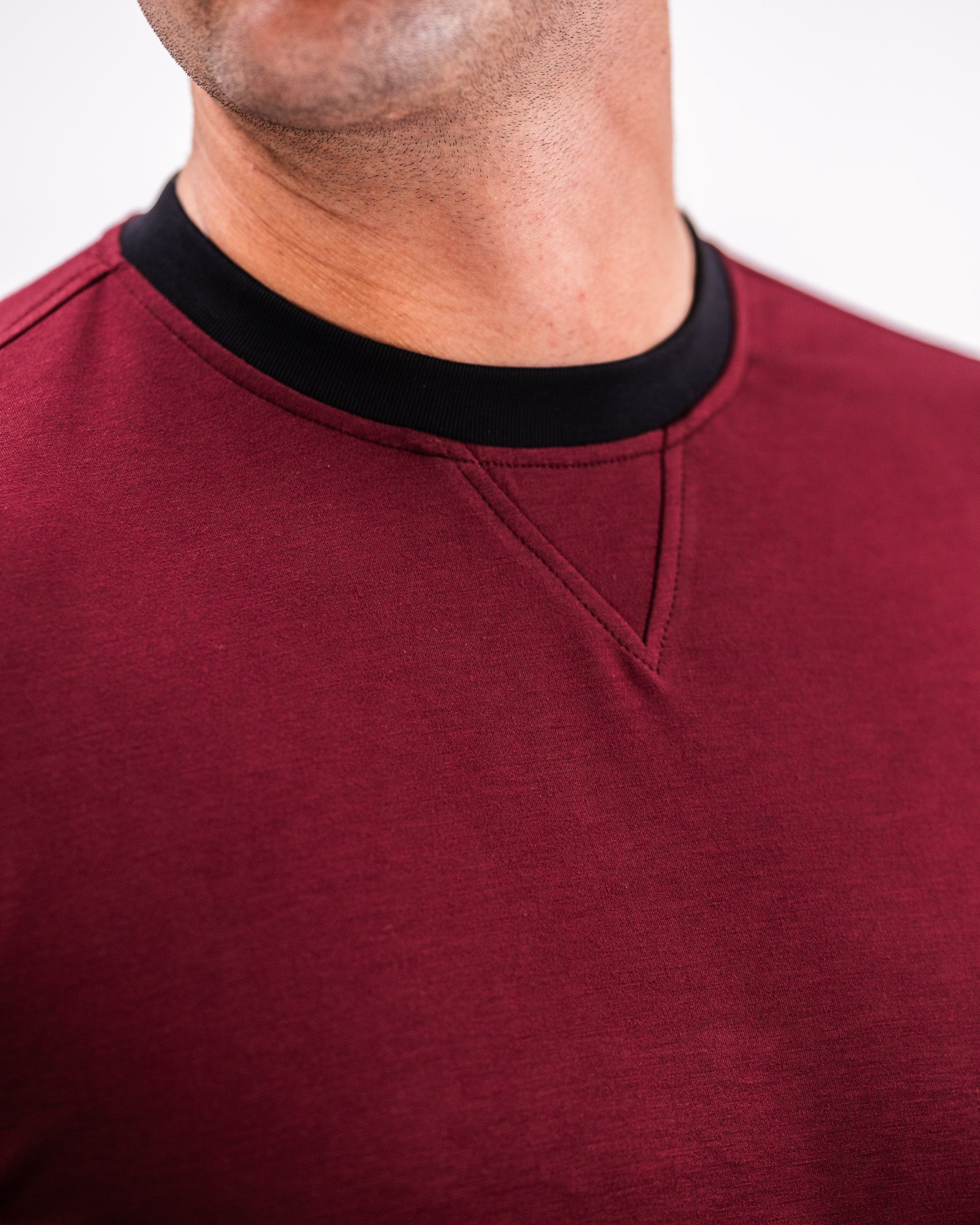 Men's Player Preferred Crewneck in Merlot featuring a classic design and contrasting black collar for a stylish look.