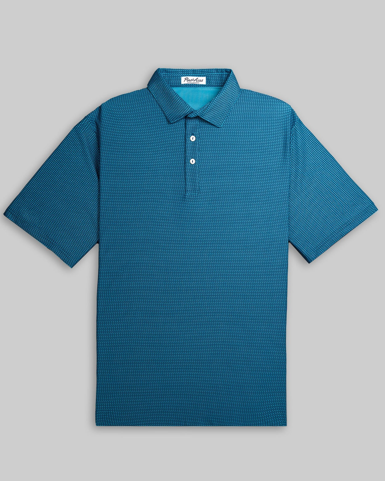 Player Preferred Polo in Ocean Wave features a textured pattern in a vibrant teal color, perfect for stylish golfers.