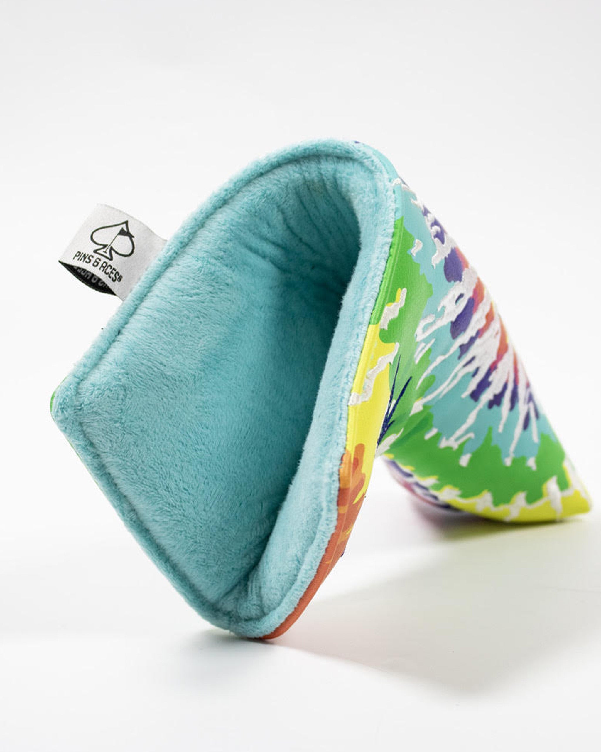 Vibrant tie-dye blade putter cover with a soft interior, designed to protect and style your golf equipment.