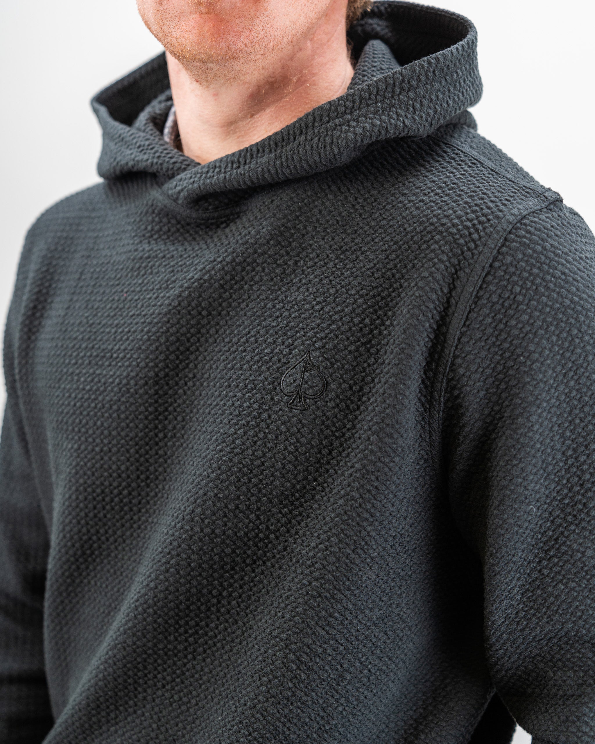 Player Preferred Waffle Knit Hoodie in Obsidian, featuring a textured fabric and a stylish hood for a comfortable fit.