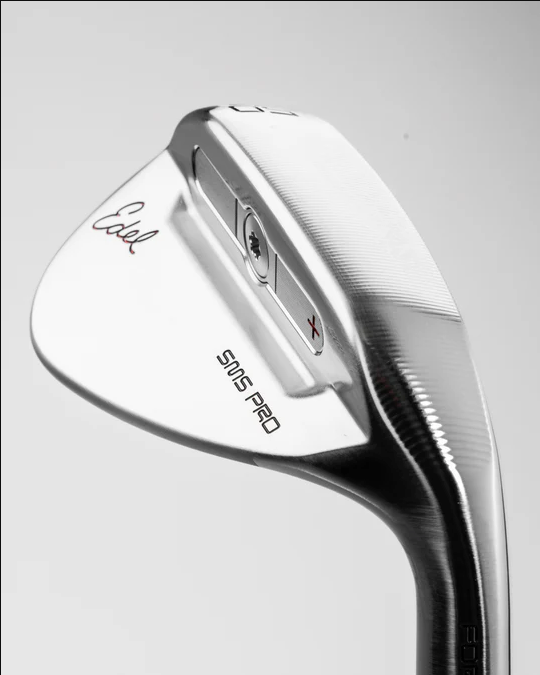 Sleek SMS Pro Wedge with a 60-degree loft, featuring precision grooves and a polished finish for optimal performance.