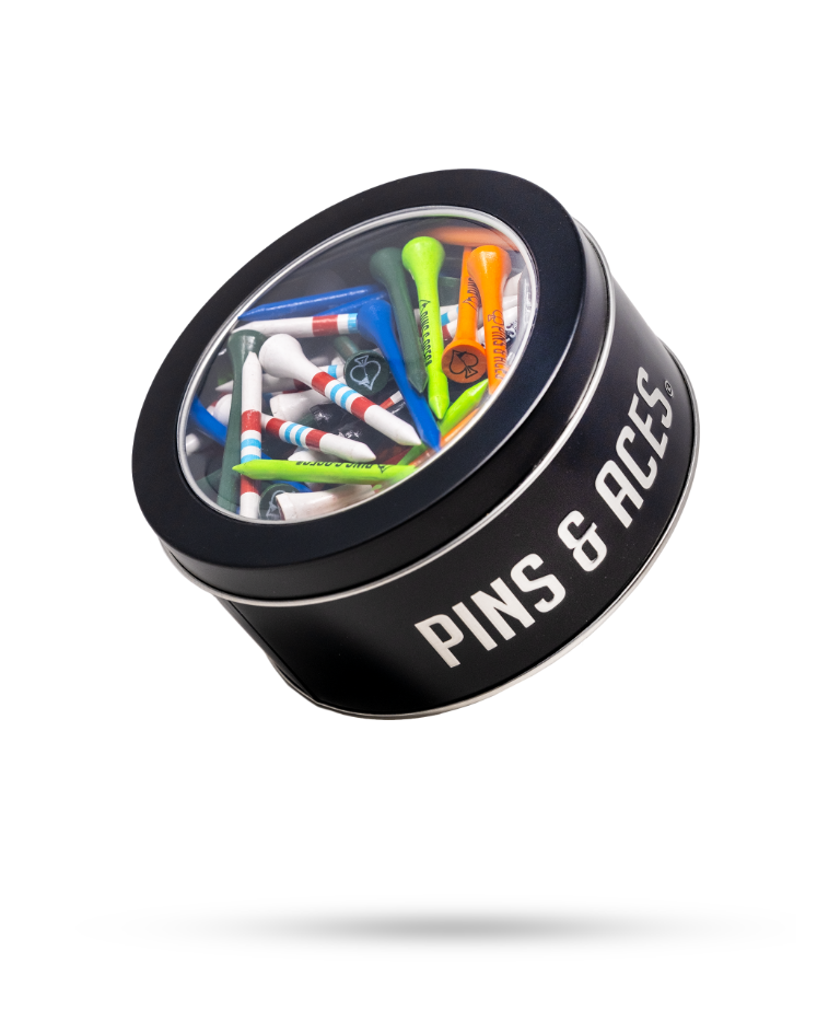 A round tin of colorful golf tees featuring various designs, labeled with the Pins and Aces brand.
