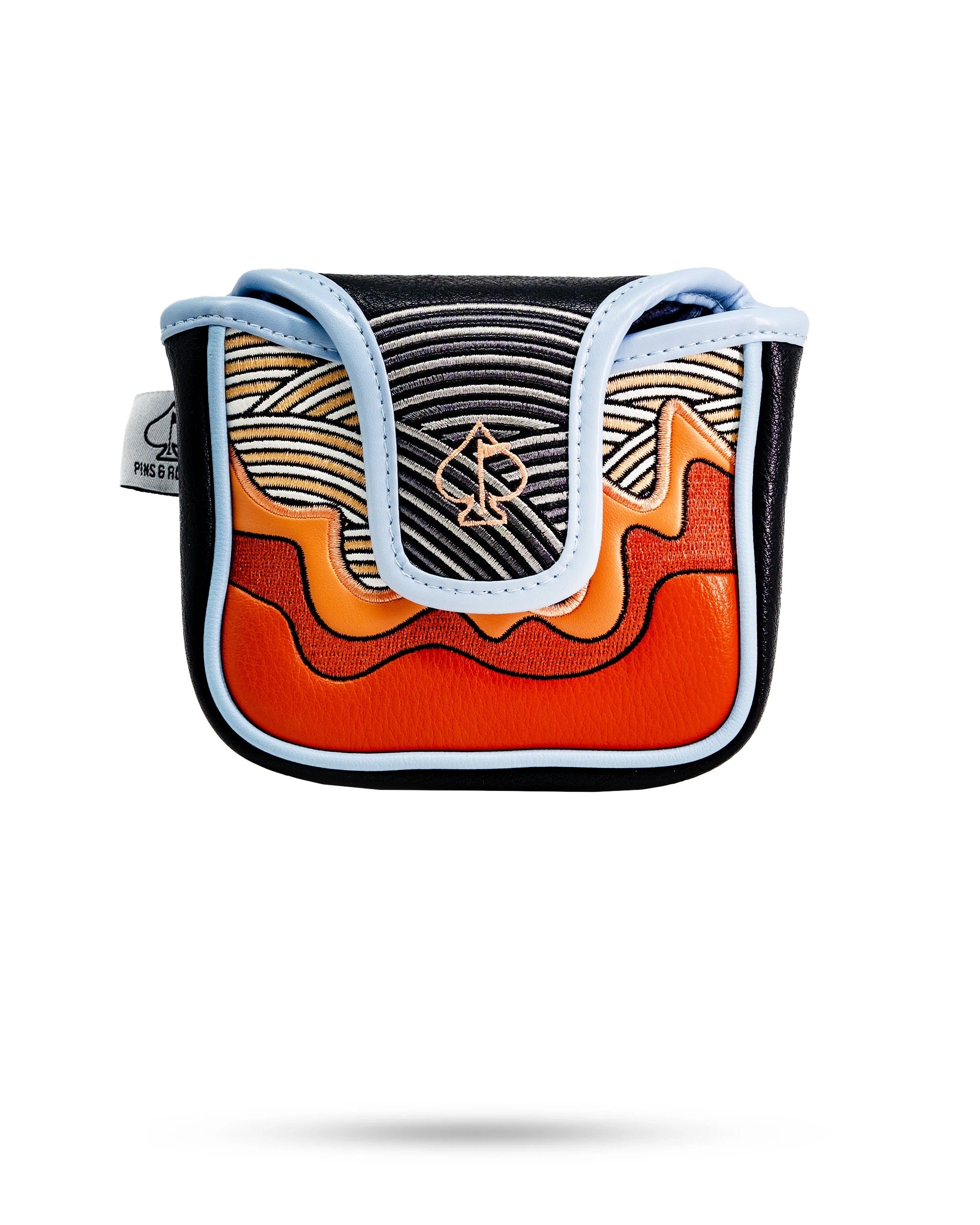 Bold mallet putter cover featuring vibrant orange and black waves with a sleek design, perfect for stylish golfers.