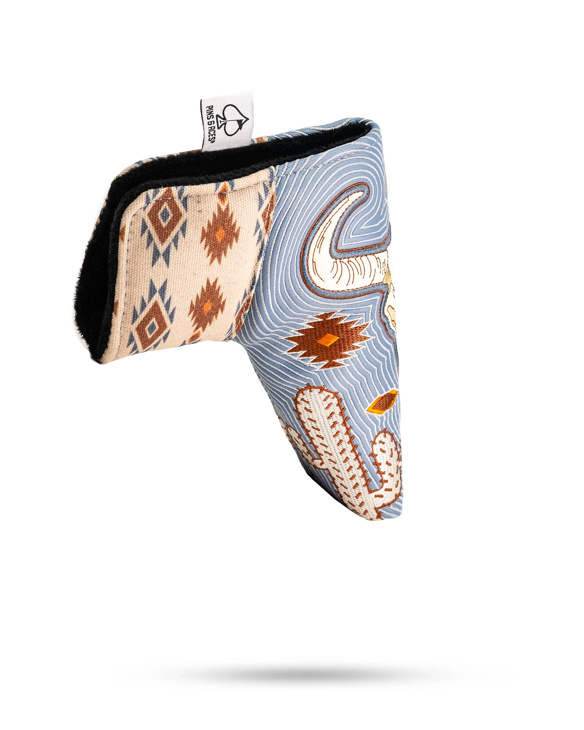 Western Aesthetic blade putter cover featuring intricate patterns and a stylish design for golfers seeking unique accessories.