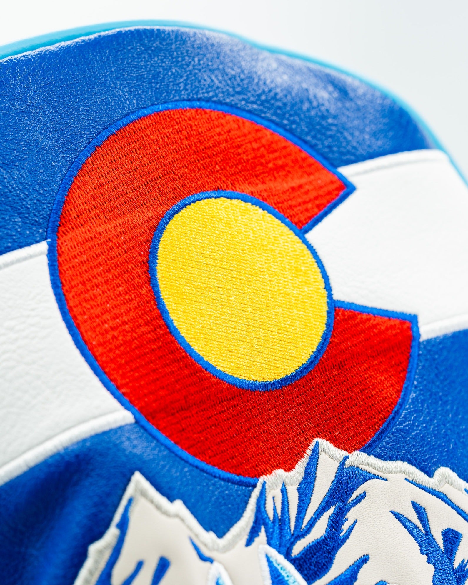 Bold driver cover featuring the Colorado state flag design with vibrant colors and mountain graphics, perfect for golfers.