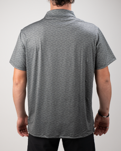 Men's Large Mouth golf shirt featuring a subtle pattern, designed for comfort and style on the course.