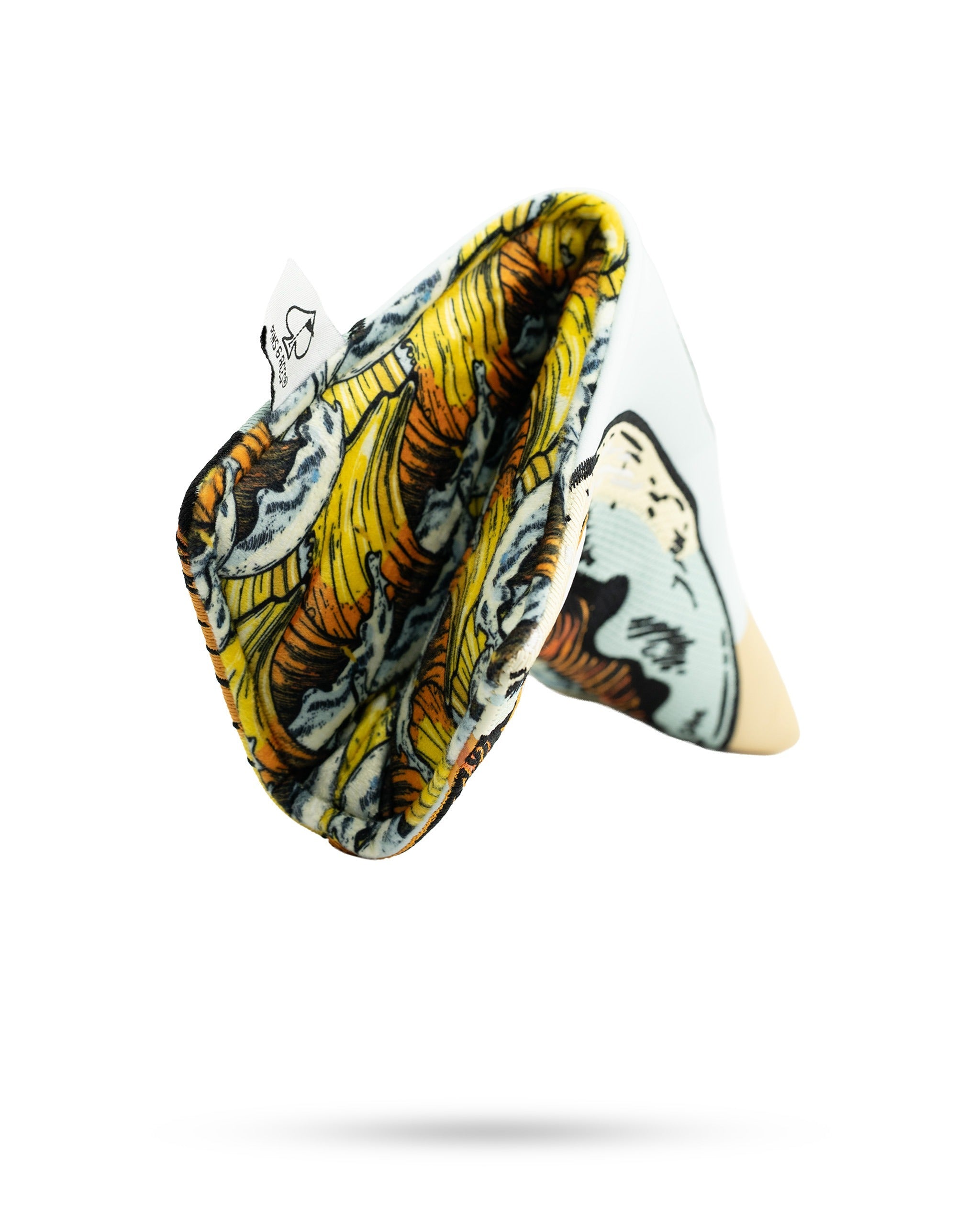 Bold blade putter cover featuring a unique design with vibrant colors and a playful pattern, perfect for standout golfers.