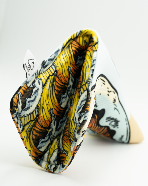 Bold putter cover featuring a unique Screwdriver design with vibrant colors and intricate graphics, perfect for golfers.