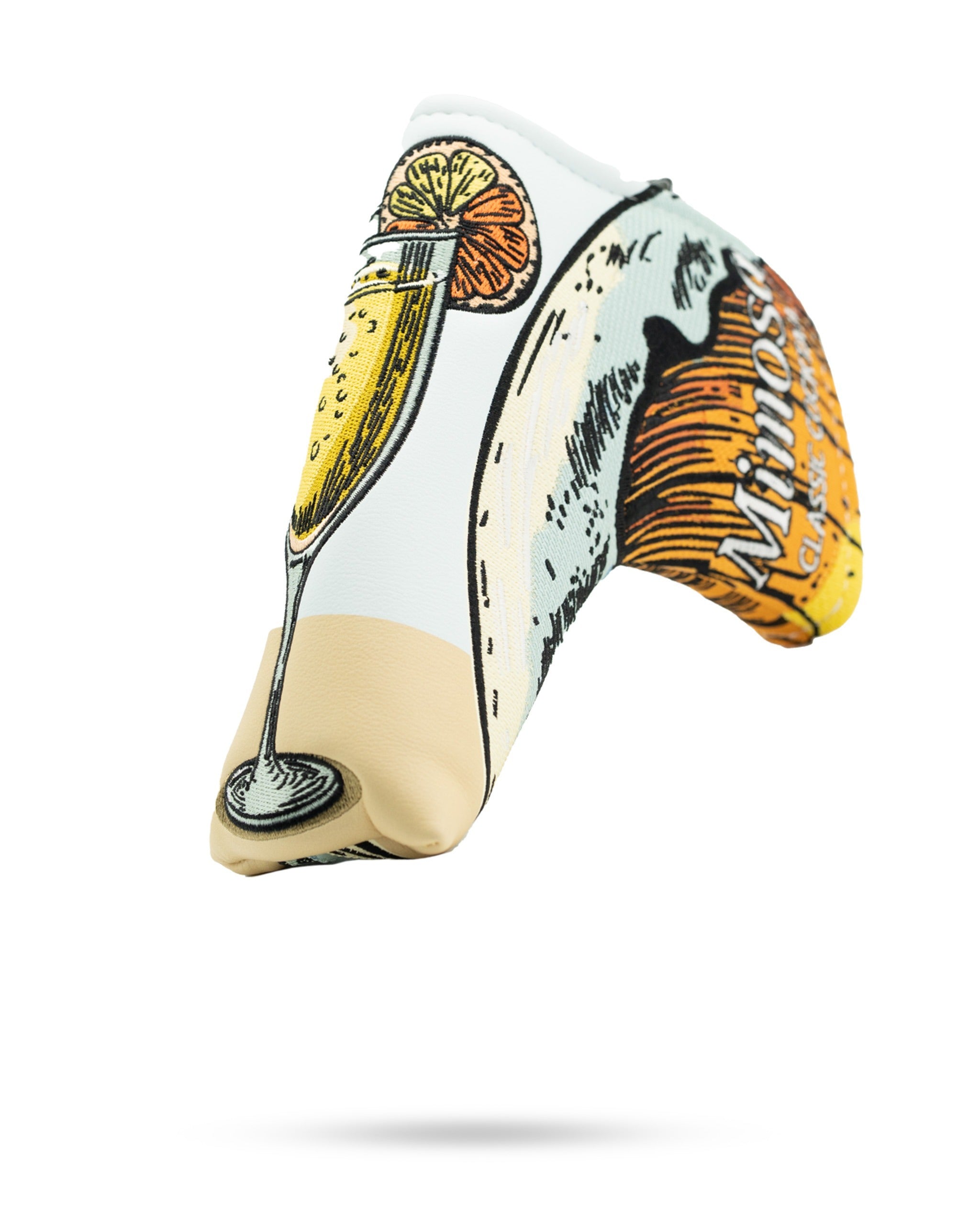 Mimosa blade putter cover featuring a vibrant design of a cocktail glass and citrus elements for stylish golf protection.