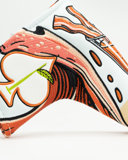 Bold Bloody Mary blade putter cover featuring vibrant graphics of a cocktail with bacon and garnishes, perfect for stylish golfers.