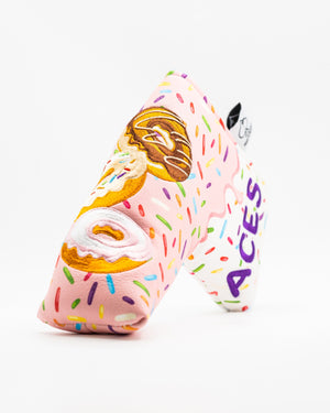Colorful blade putter cover featuring a donut design with sprinkles, perfect for golfers seeking a fun and unique accessory.