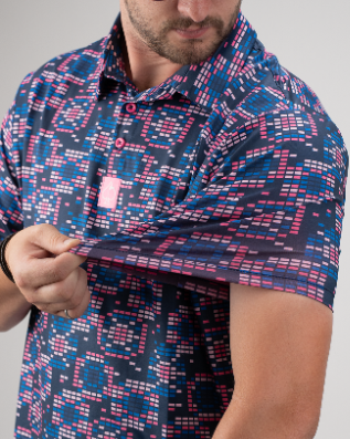 Men's Tetrafloral Dark golf shirt featuring a vibrant geometric pattern in navy, pink, and teal for a bold on-course look.