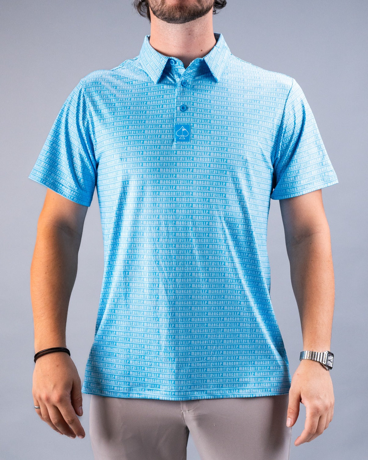 Light blue polo shirt featuring a unique pattern, perfect for stylish golfers seeking comfort and flair on the course.
