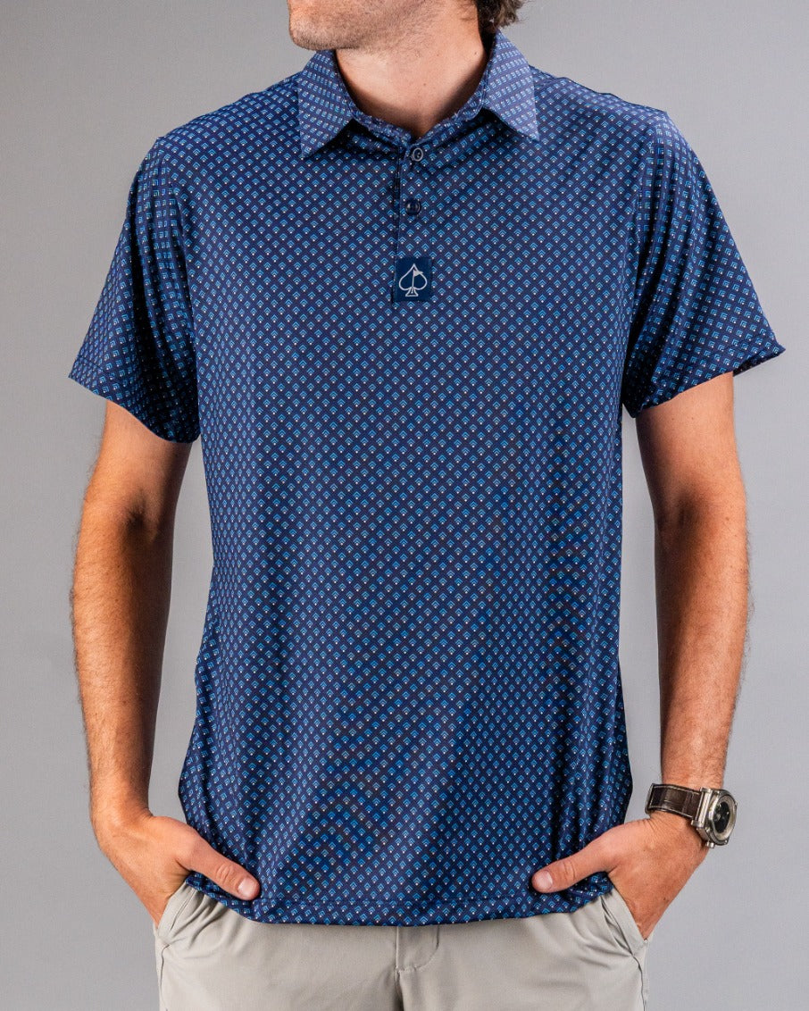 Men's blue golf polo featuring a geometric pattern, designed for comfort and style on the course.