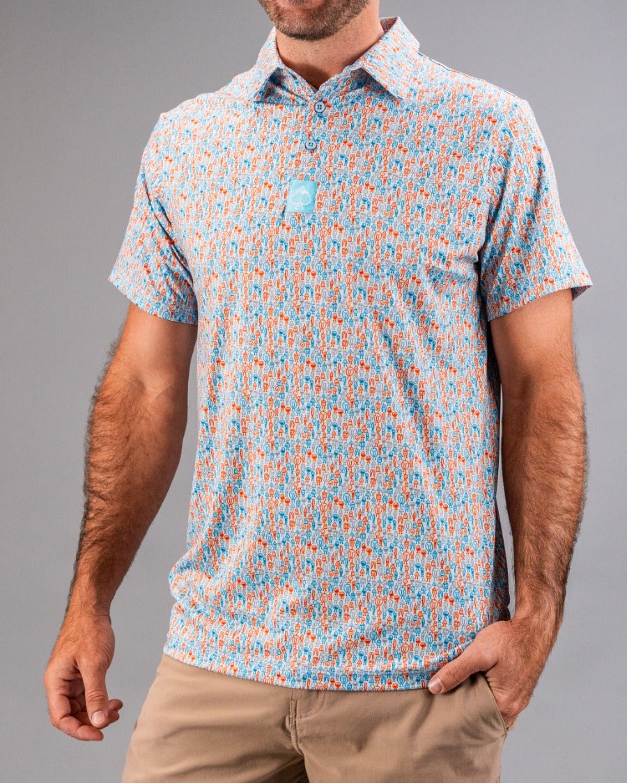 Men's short-sleeve golf shirt featuring a vibrant blue and orange doodle pattern, perfect for stylish performance on the course.