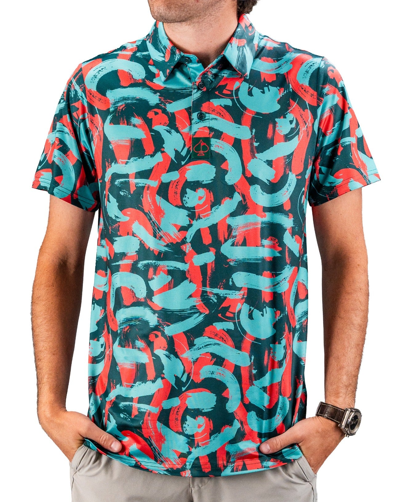 Bold golf polo shirt featuring a vibrant coral and teal paint stroke pattern, perfect for stylish golfers on the course.