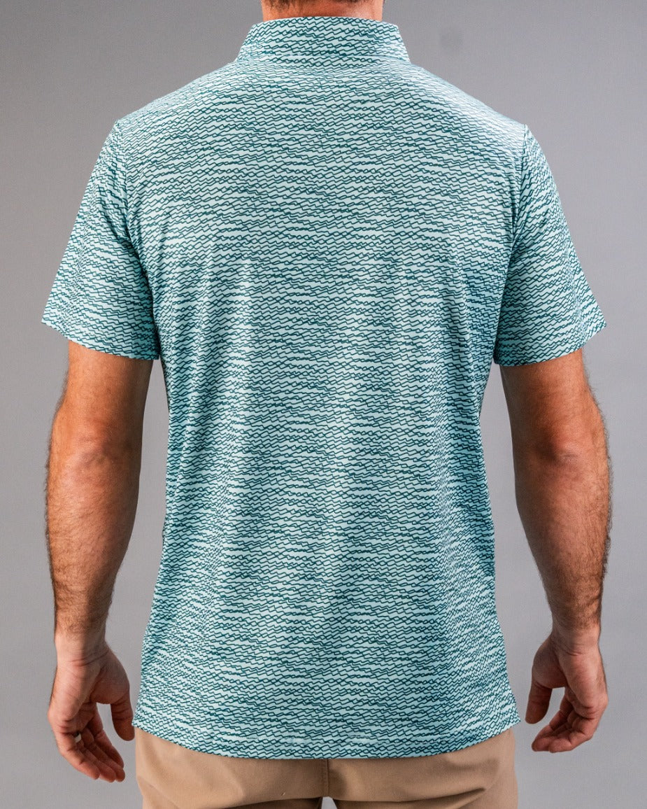 Men's Squiggle Teal golf shirt featuring a unique wave pattern, designed for style and comfort on the course.