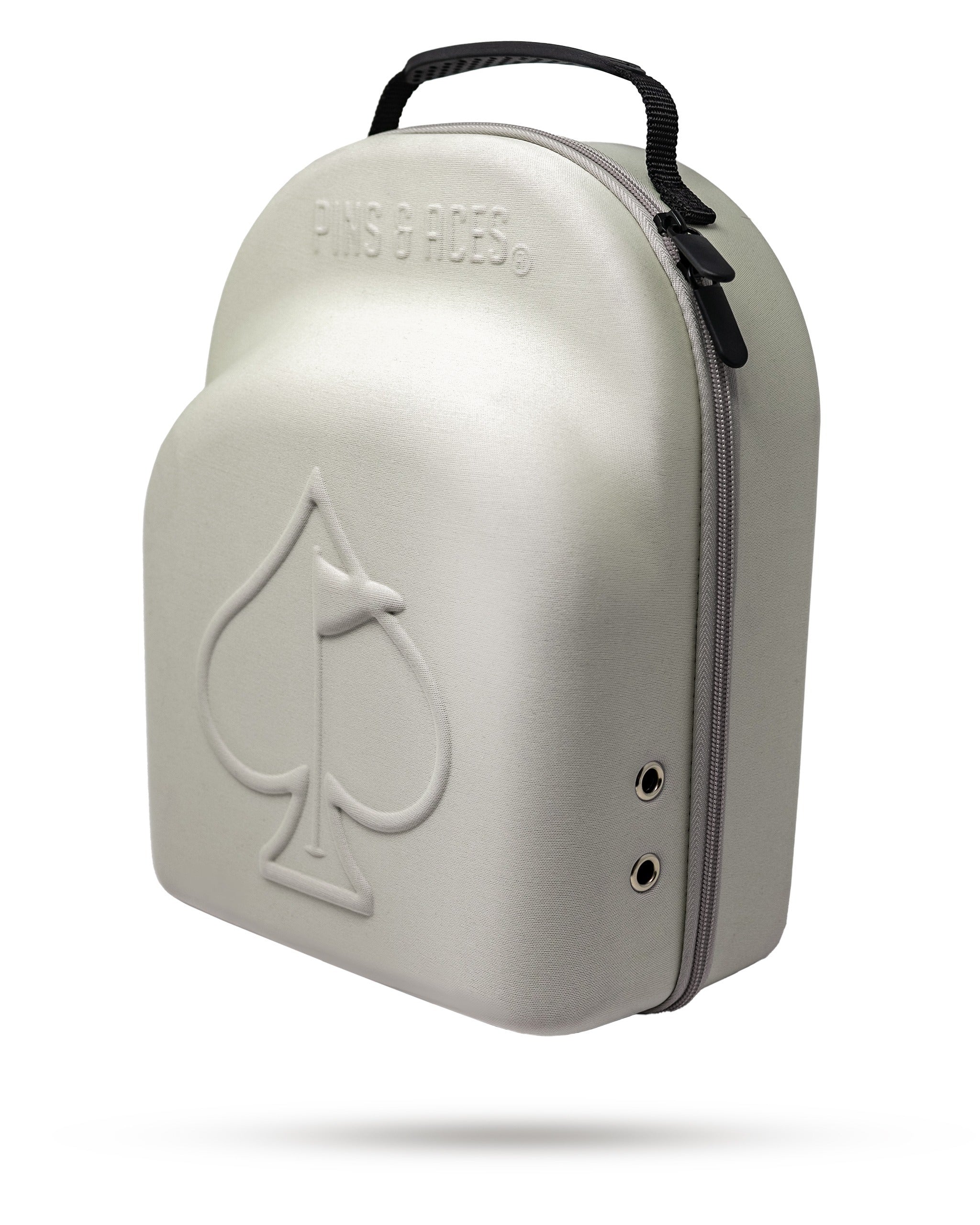 Stylish hat caddy from Pins and Aces, designed to protect and store golf hats with a durable exterior and convenient handle.