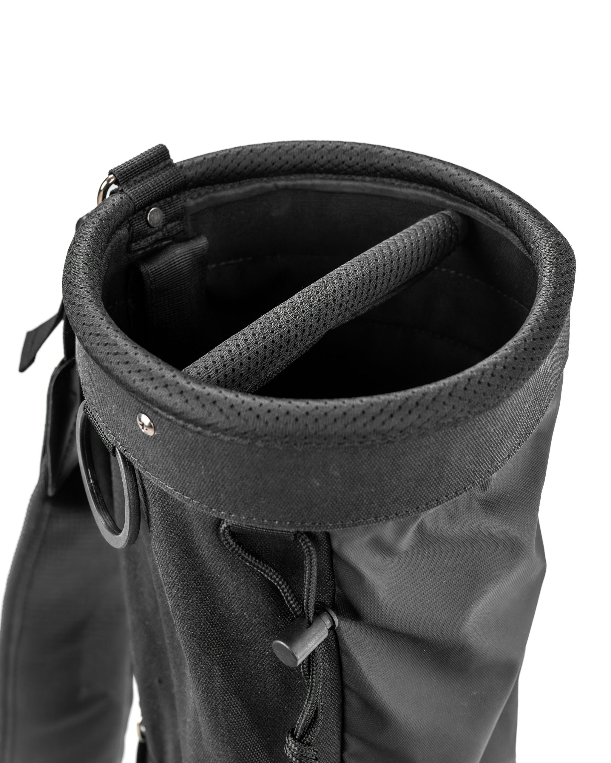 Top view of a Sunday golf bag showcasing its sleek black design and padded interior for club protection.