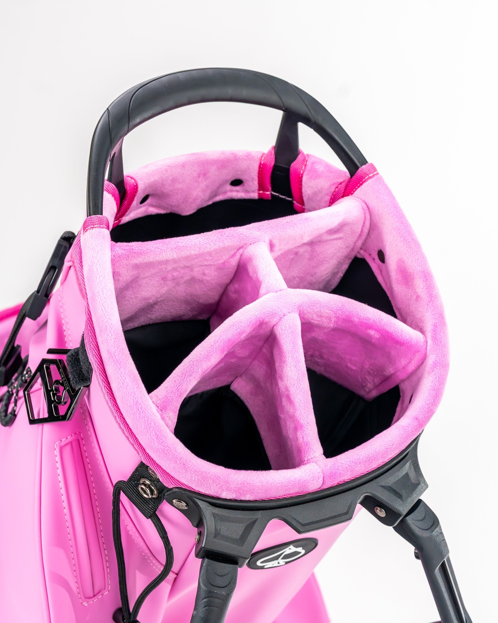Interior view of the Player Preferred Golf Bag in Bubblegum 2.0, featuring plush dividers for organized club storage.