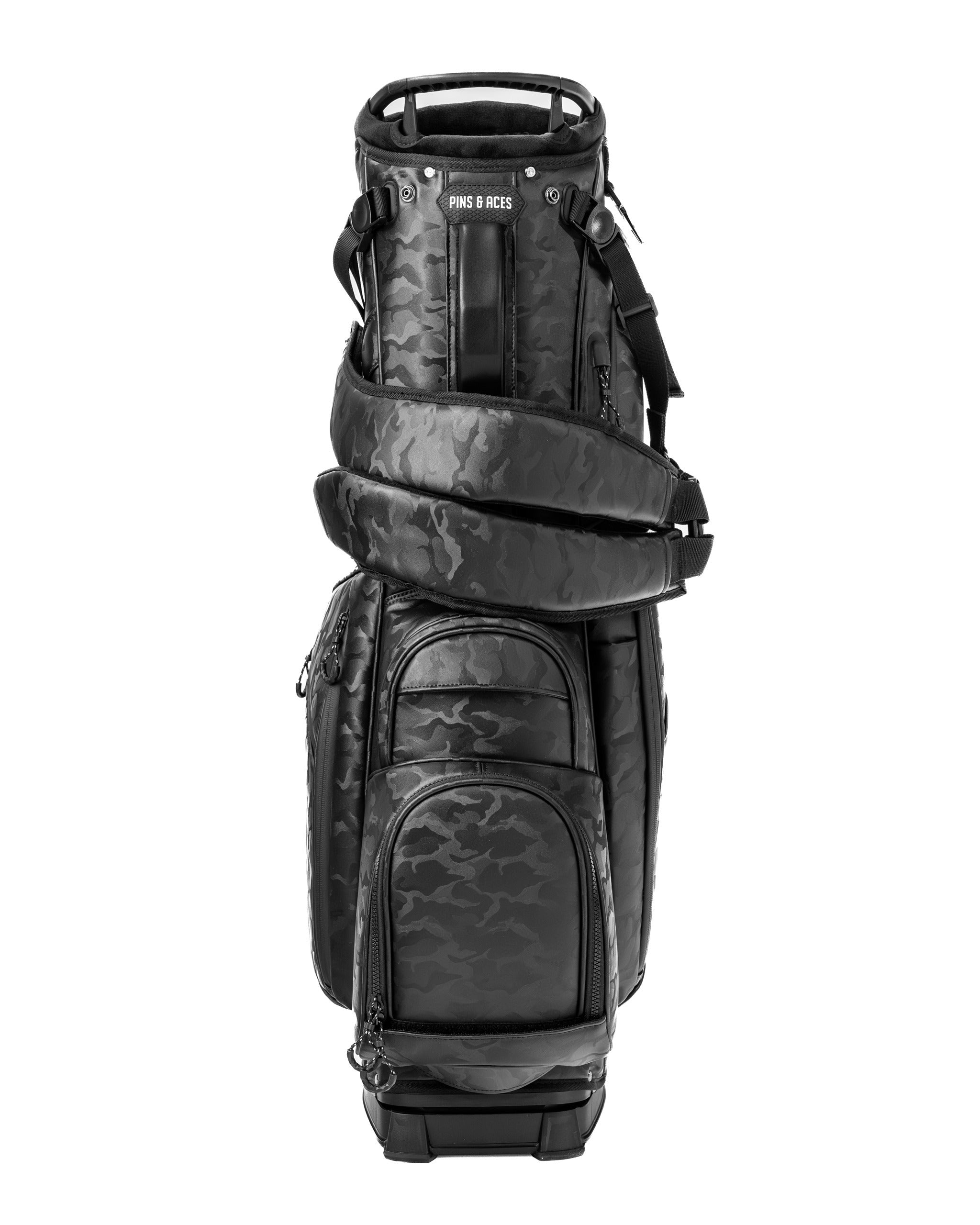 Stylish black camo golf bag featuring multiple pockets and a comfortable shoulder strap for easy carrying on the course.